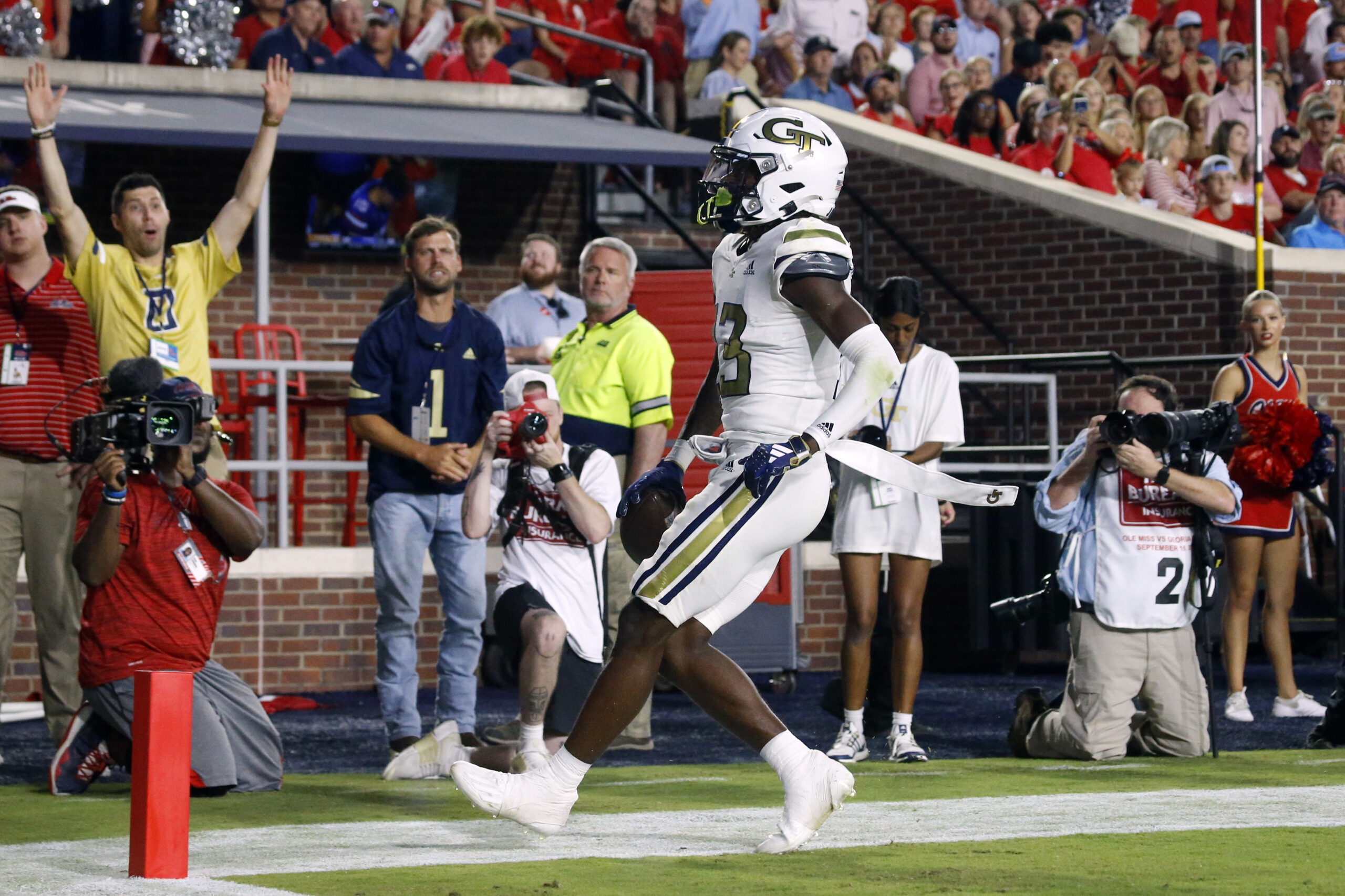 Sep 16, 2023; Oxford, Mississippi, USA; Georgia Tech Yellow Jackets wide receiver Eric Singleton, Jr. (13) scores a touchdown during the second half against the Mississippi Rebels at Vaught-Hemingway Stadium. 