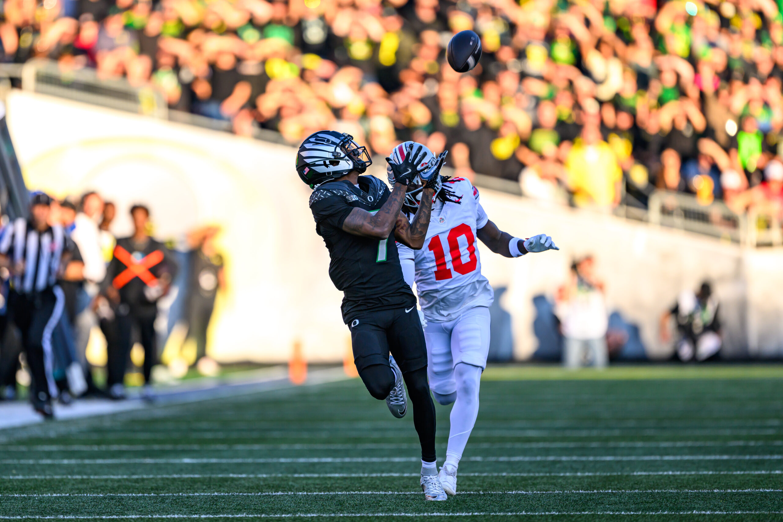 Oct 12, 2024; Eugene, Oregon, USA; Oregon Ducks wide receiver Evan Stewart (7) catches a pass during the first half against the Ohio State Buckeyes at Autzen Stadium.