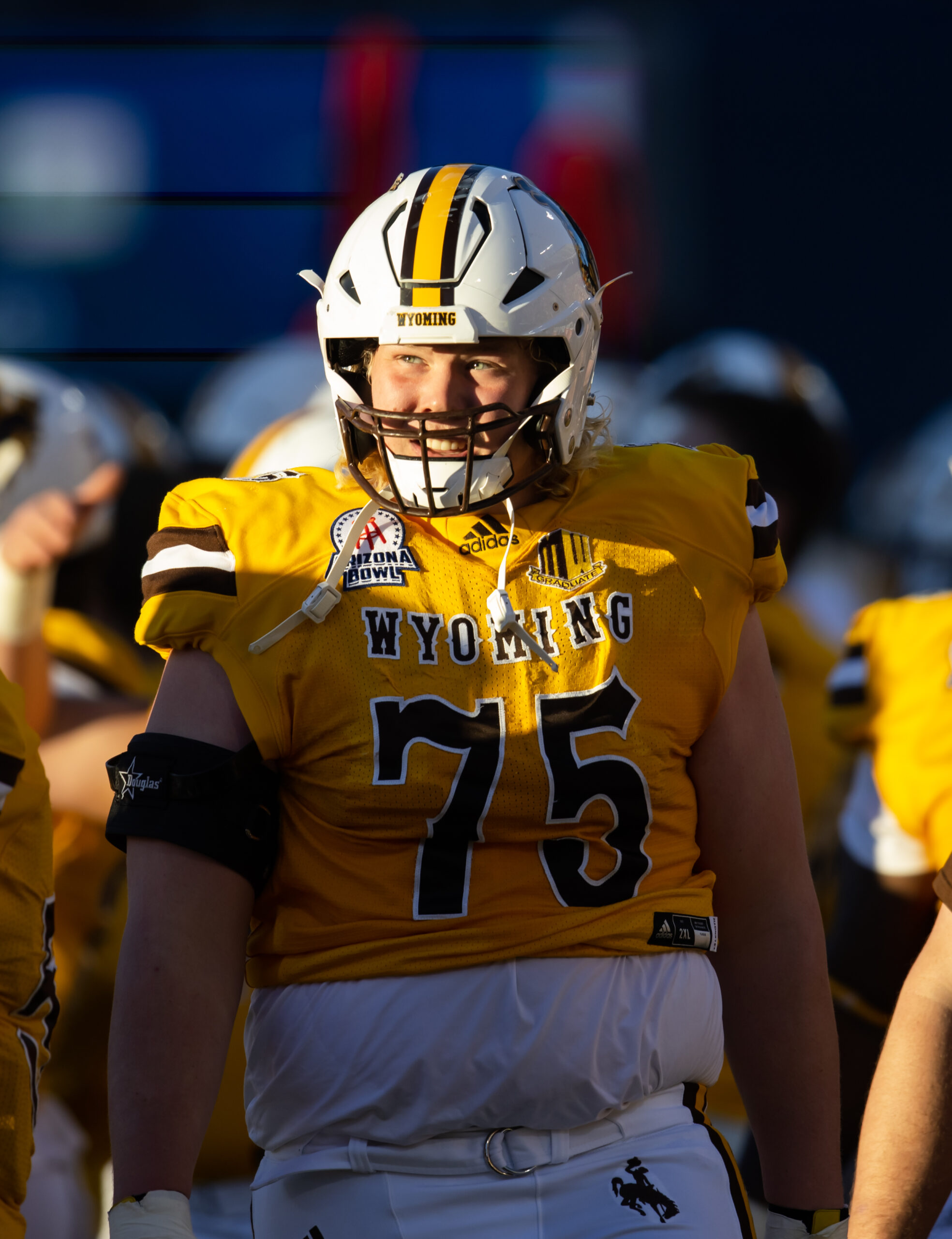 Dec 30, 2022; Tucson, AZ, USA; Wyoming Cowboys offensive tackle Frank Crum (75) against the Ohio Bobcats during the 2022 Barstool Sports Arizona Bowl at Arizona Stadium.