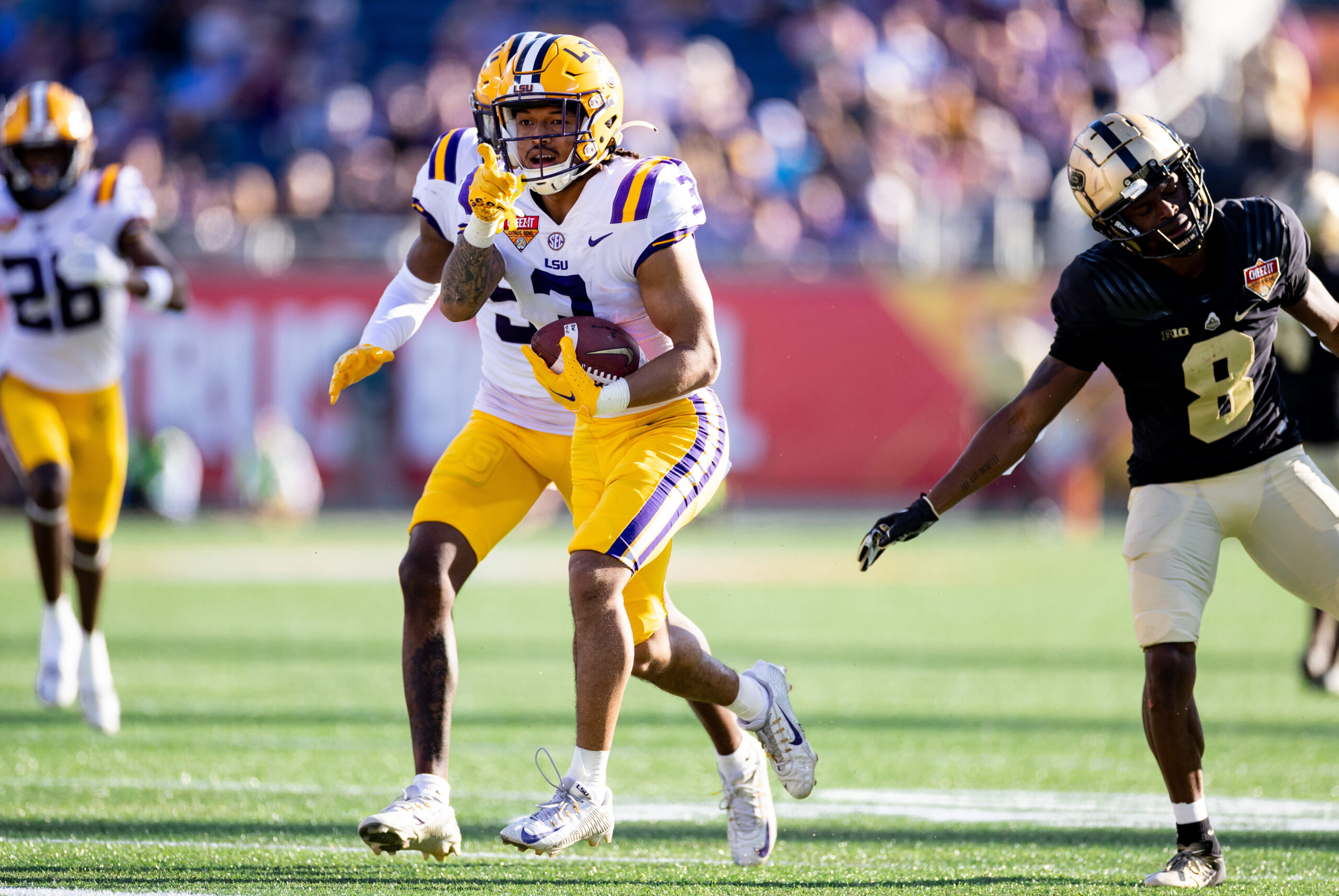 Jan 2, 2023; Orlando, FL, USA; LSU Tigers safety Greg Brooks Jr. (3) gestures after an interception during the second half against the Purdue Boilermakers at Camping World Stadium.