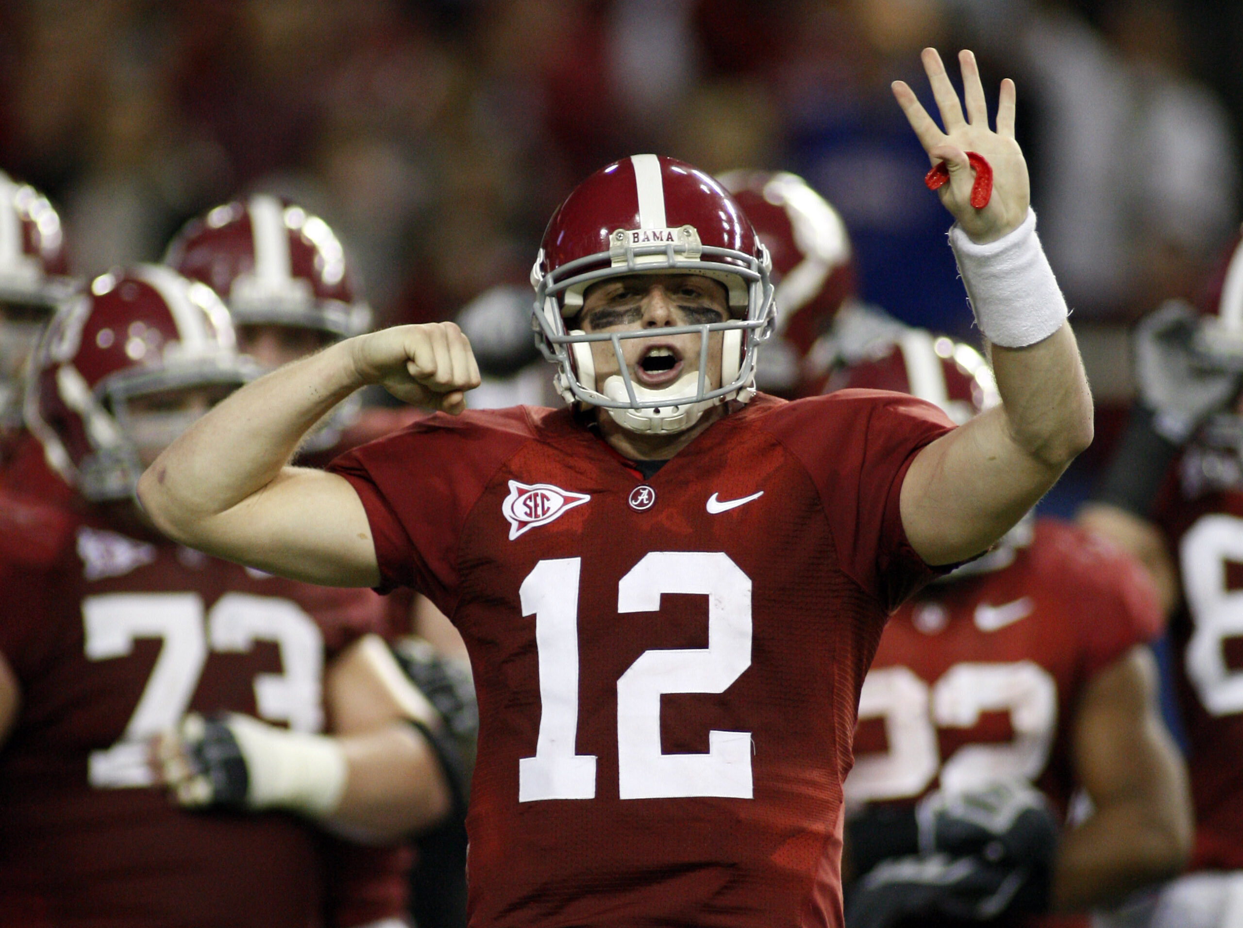 Dec 5, 2009; Atlanta, GA, USA; Alabama Crimson Tide quarterback Greg McElroy (12) signals to the bench during the second half of the 2009 SEC championship game against the Florida Gators at the Georgia Dome.