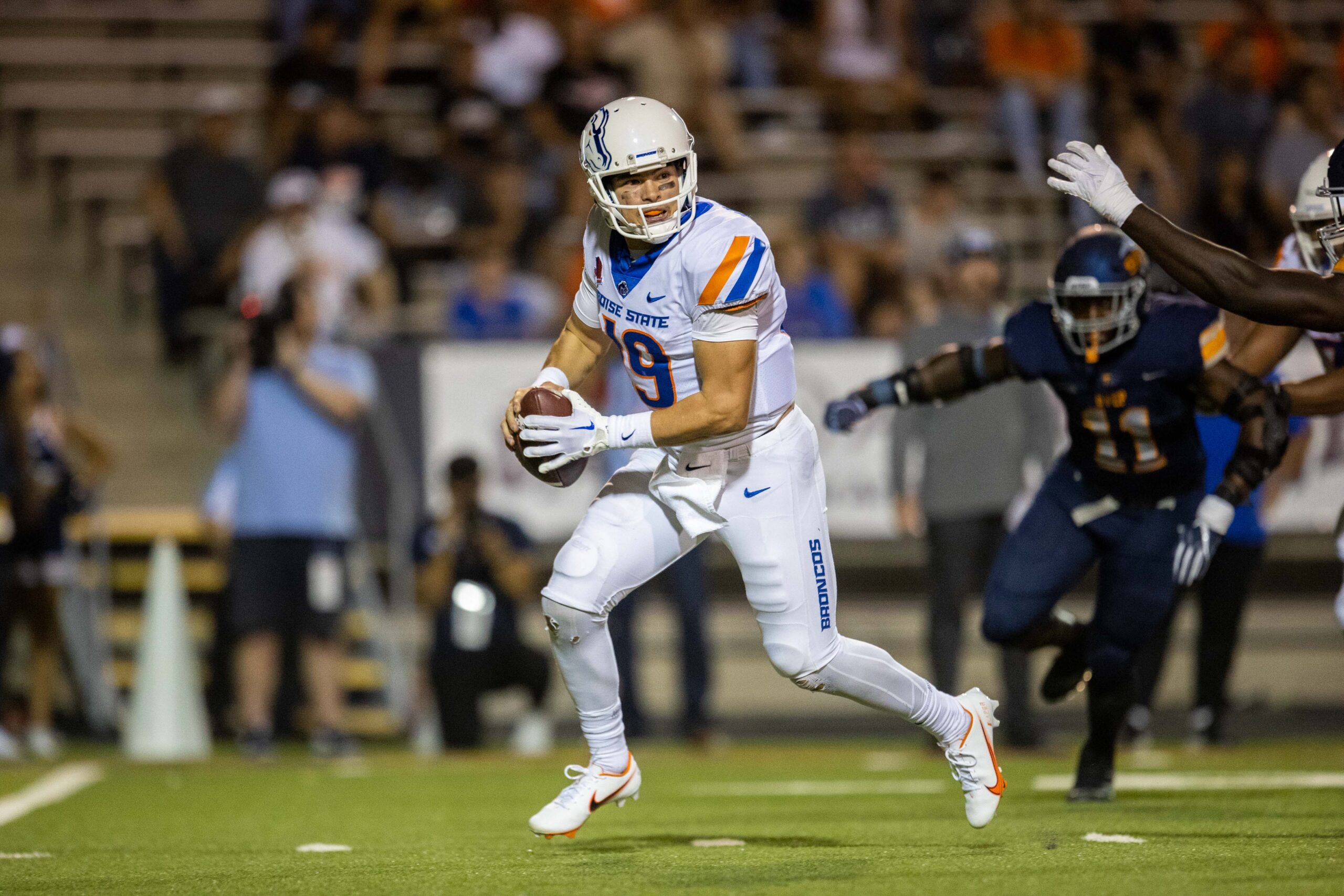 Sep 23, 2022; El Paso, Texas, USA; Boise State quarterback Hank Bachmeier (19) against the UTEP Miners defense in the first half at Sun Bowl.