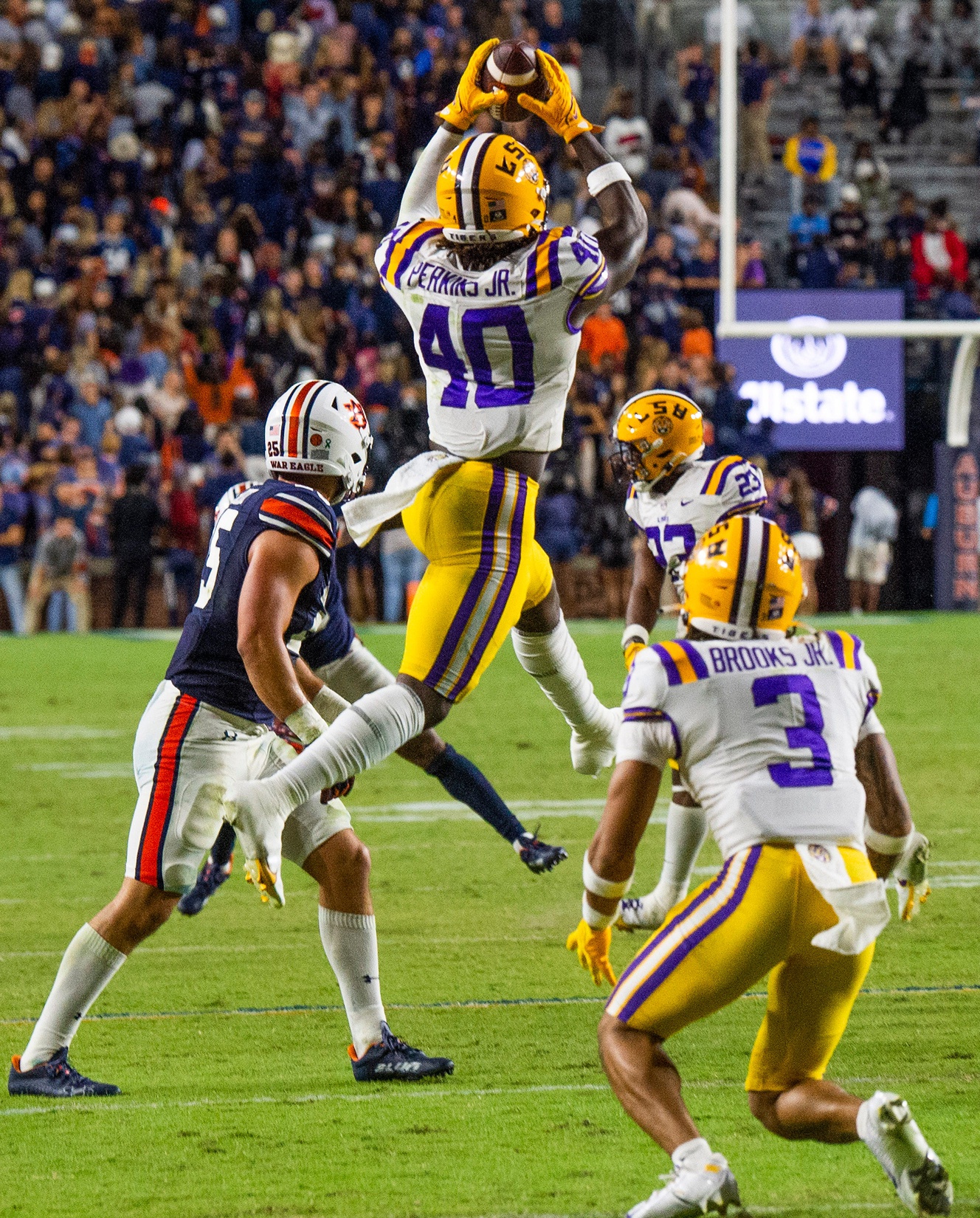 LSU Tigers linebacker Harold Perkins Jr. (40) makes an interception against LSU as the Auburn Tigers take on the LSU Tigers at Jordan-Hare Stadium in Auburn, Ala., on Saturday, Oct. 1, 2022.