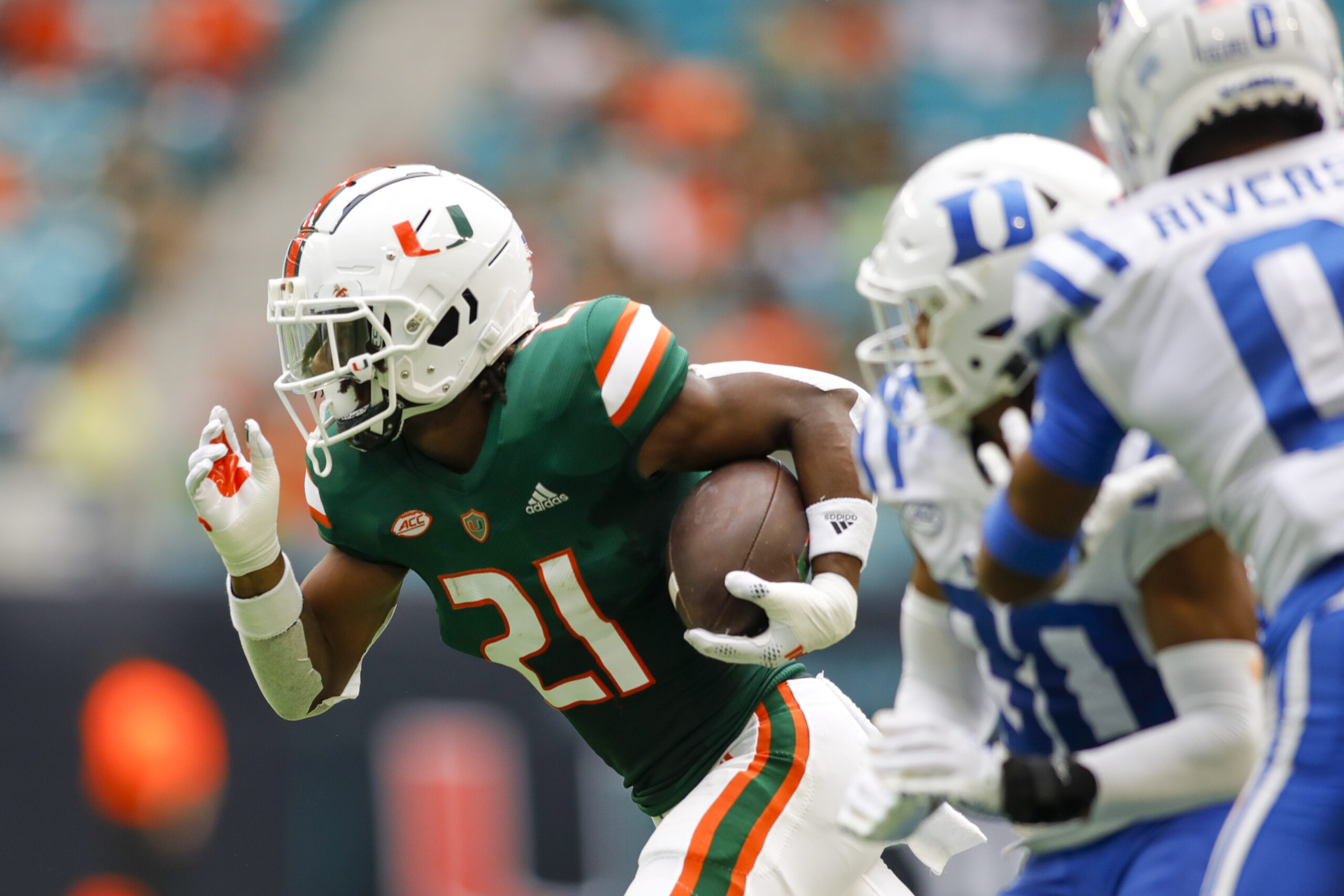 Oct 22, 2022; Miami Gardens, Florida, USA; Miami Hurricanes running back Henry Parrish Jr. (21) runs with the football during the first quarter against the Duke Blue Devils at Hard Rock Stadium.