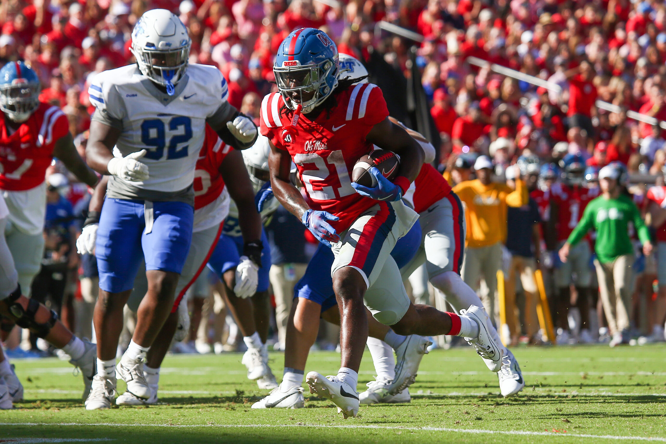 Sep 7, 2024; Oxford, Mississippi, USA; Mississippi Rebels running back Henry Parrish Jr. (21) runs the ball for a touchdown during the first half against the Middle Tennessee Blue Raiders at Vaught-Hemingway Stadium.