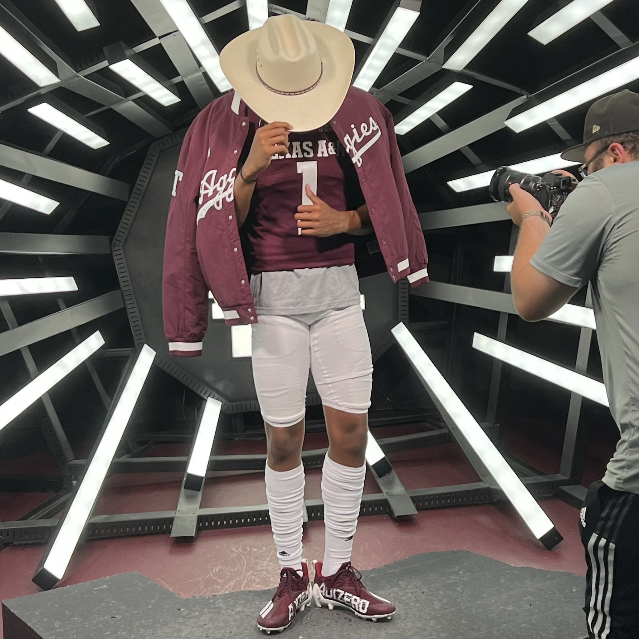 2025 3-Star QB Hype Grand from Orange, CA, takes a picture during a visit to Texas A&M
