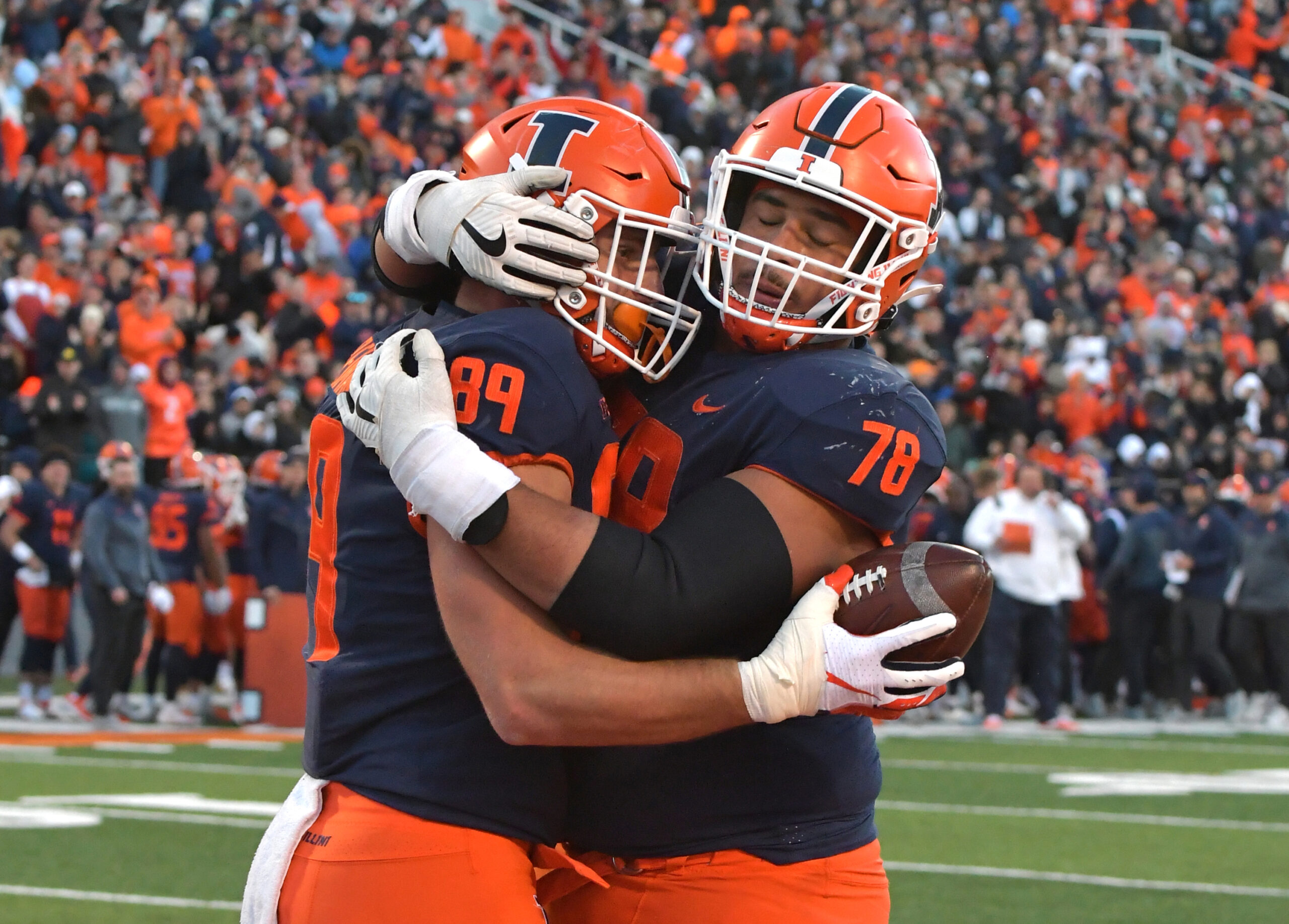 Nov 5, 2022; Champaign, Illinois, USA; Illinois Fighting Illini offensive lineman Isaiah Adams (78) congratulates i tight end Tip Reiman (89) after his two-point conversion during the second half at Memorial Stadium.