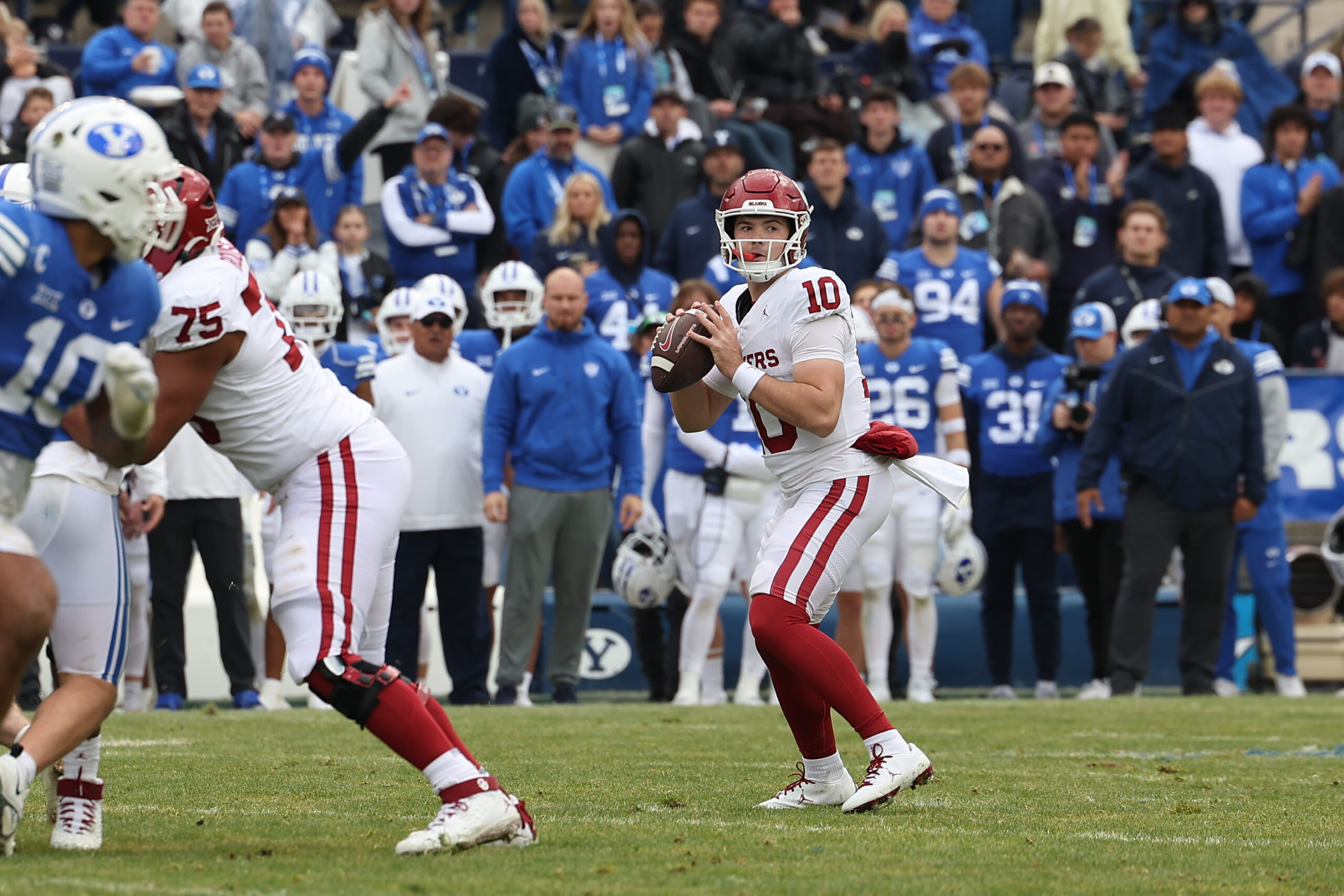 Nov 18, 2023; Provo, Utah, USA; Oklahoma Sooners quarterback Jackson Arnold (10) drops back to pass against the Brigham Young Cougars in the fourth quarter at LaVell Edwards Stadium.