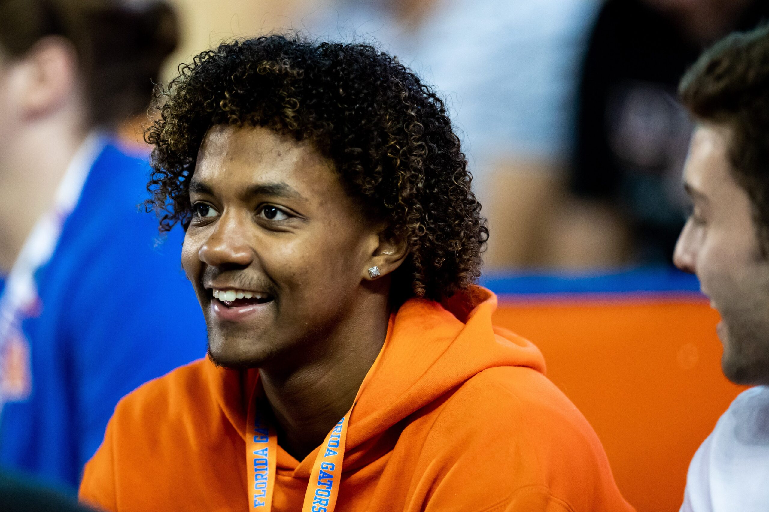 Florida Gators recruit Jaden Rashada smiles on the sideline during the second half against the Florida Gators at Steve Spurrier Field at Ben Hill Griffin Stadium in Gainesville, FL on Saturday, November 12, 2022.