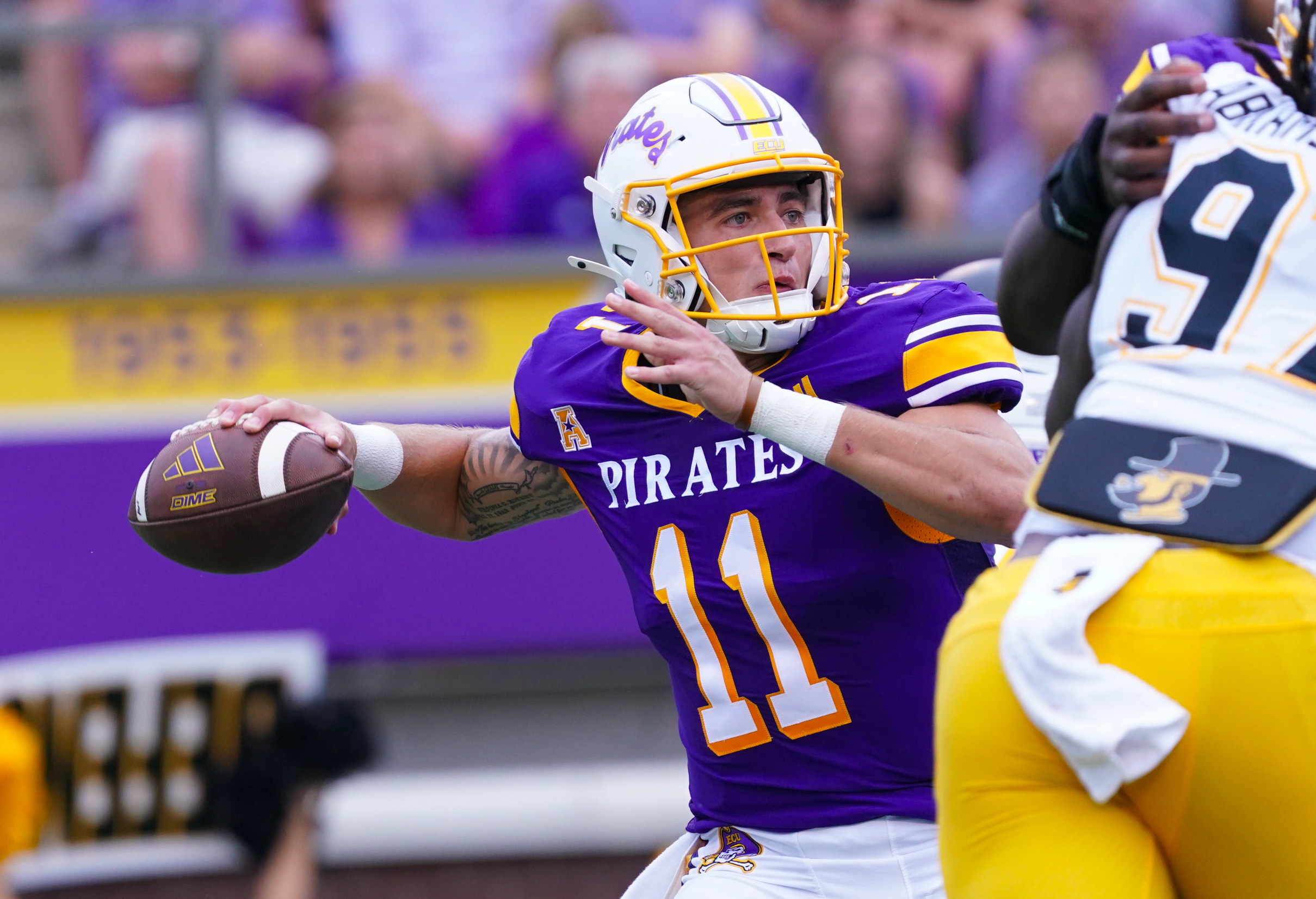 Sep 14, 2024; Greenville, North Carolina, USA; East Carolina Pirates quarterback Jake Garcia (11) throws the ball against the Appalachian State Mountaineers during the first half at Dowdy-Ficklen Stadium. 