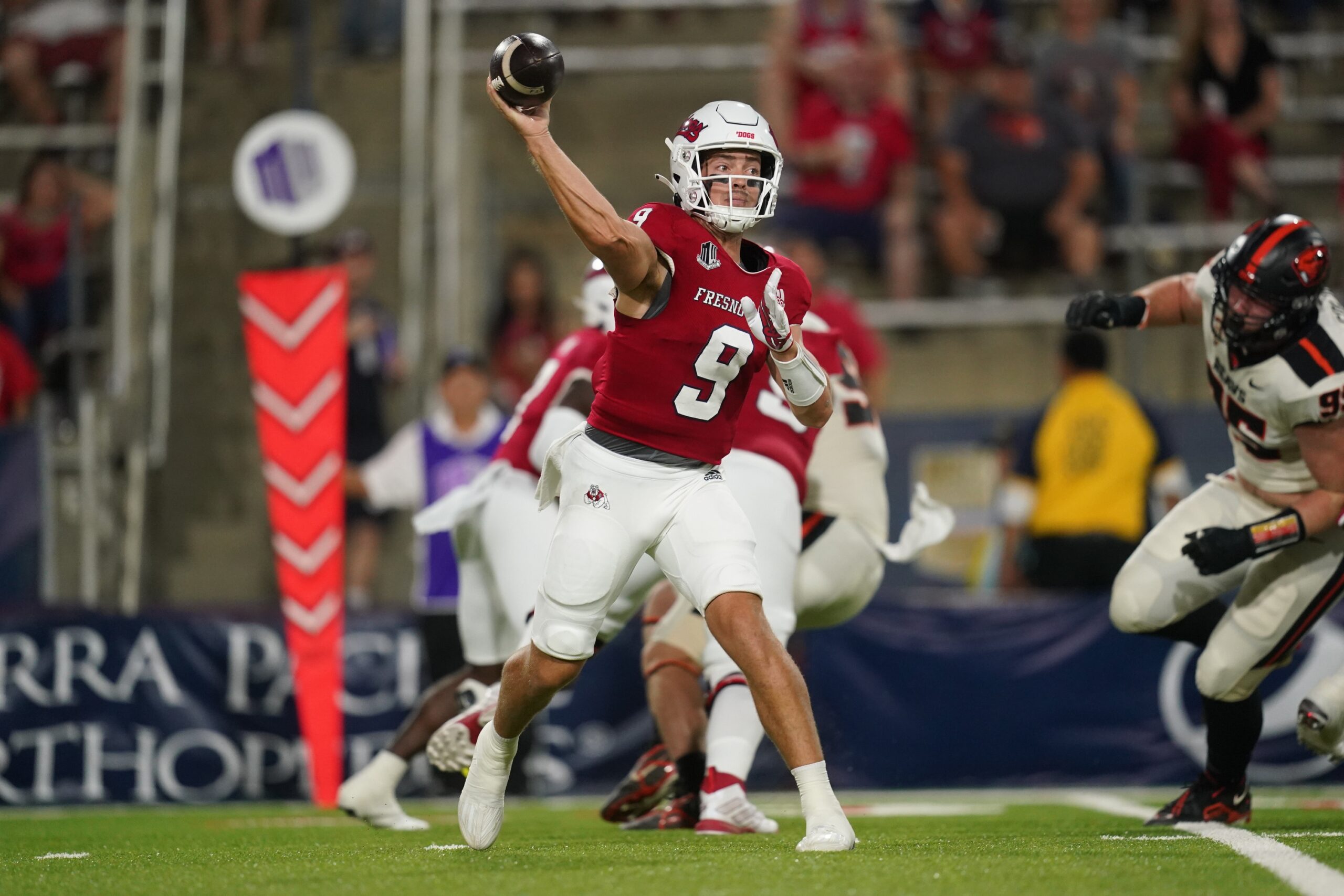 Sep 10, 2022; Fresno, California, USA; Fresno State Bulldogs quarterback Jake Haener (9) throws a pass against the Oregon State Beavers in the first quarter at Valley Children's Stadium.