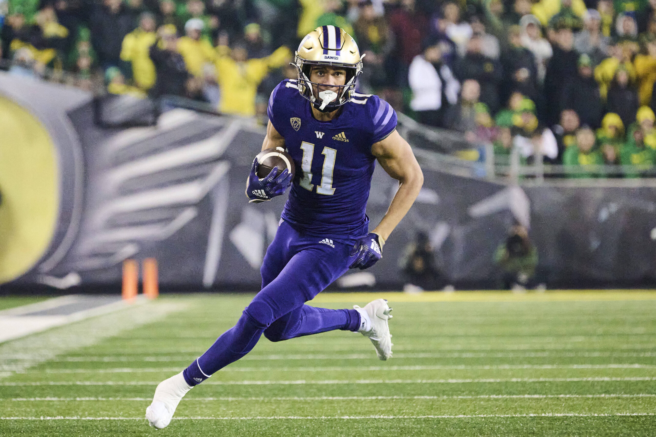 Nov 12, 2022; Eugene, Oregon, USA; Washington Huskies wide receiver Jalen McMillan (11) catches a pass for a first down during the second half against the Oregon Ducks at Autzen Stadium. The Huskies won the game 37-34.