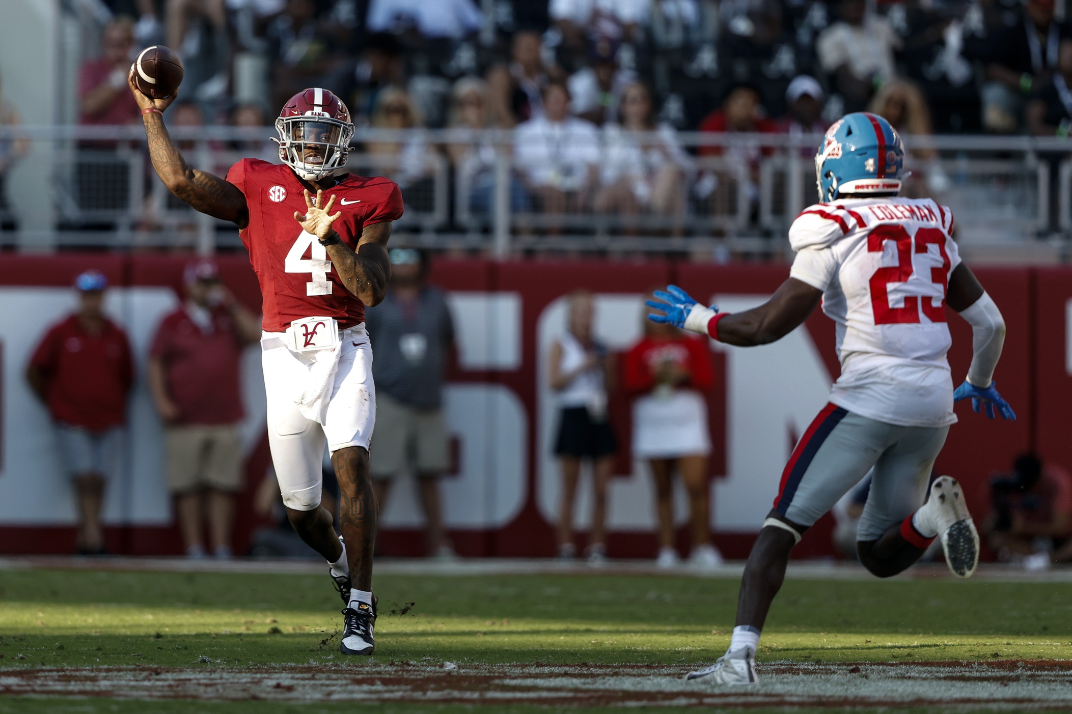 Sep 23, 2023; Tuscaloosa, Alabama, USA; Alabama Crimson Tide quarterback Jalen Milroe (4) throws a pass against the Mississippi Rebels during the second half of a football game at Bryant-Denny Stadium.