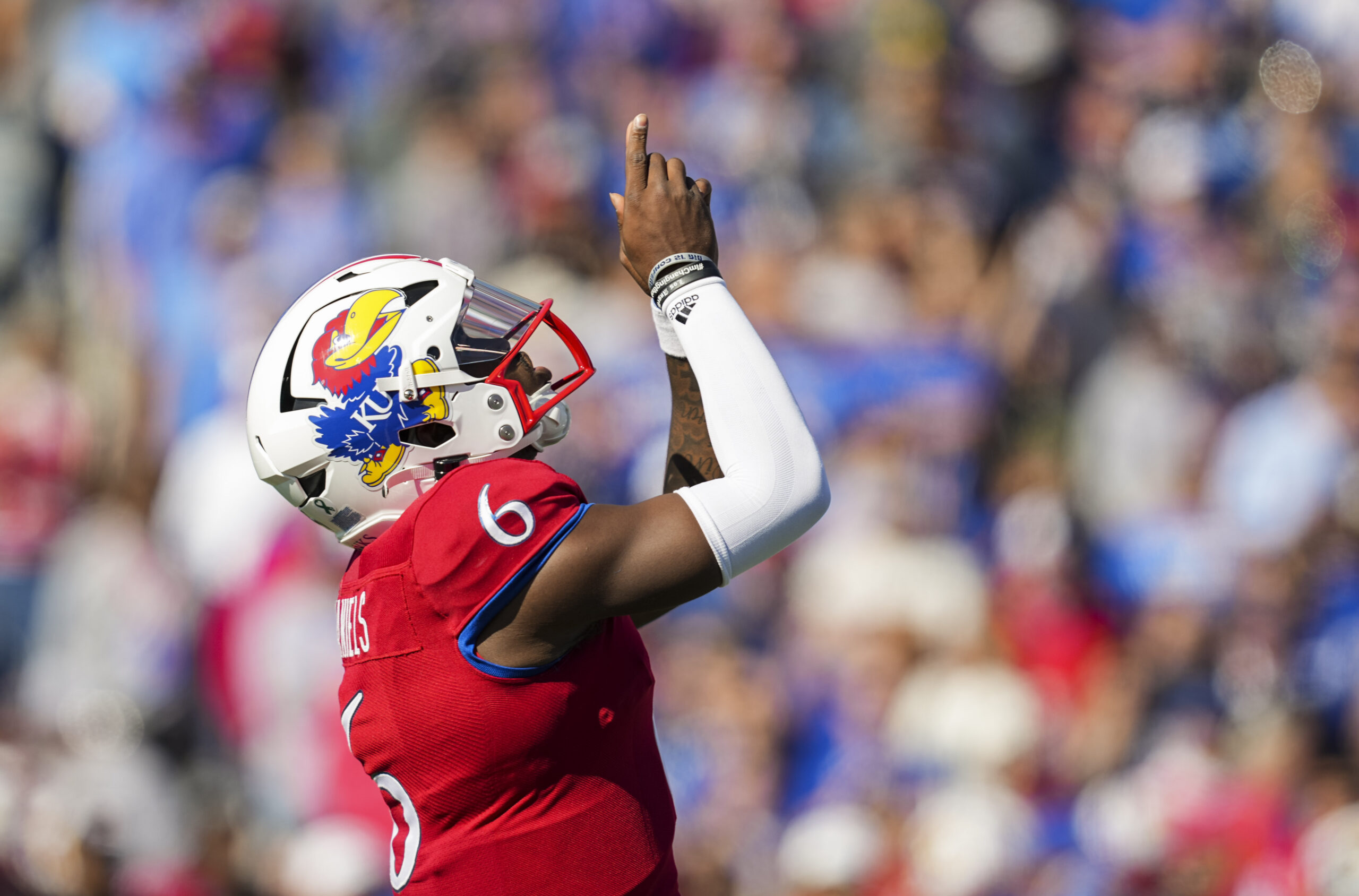 Oct 8, 2022; Lawrence, Kansas, USA; Kansas Jayhawks quarterback Jalon Daniels (6) gets ready before the snap against the TCU Horned Frogs during the first half at David Booth Kansas Memorial Stadium.