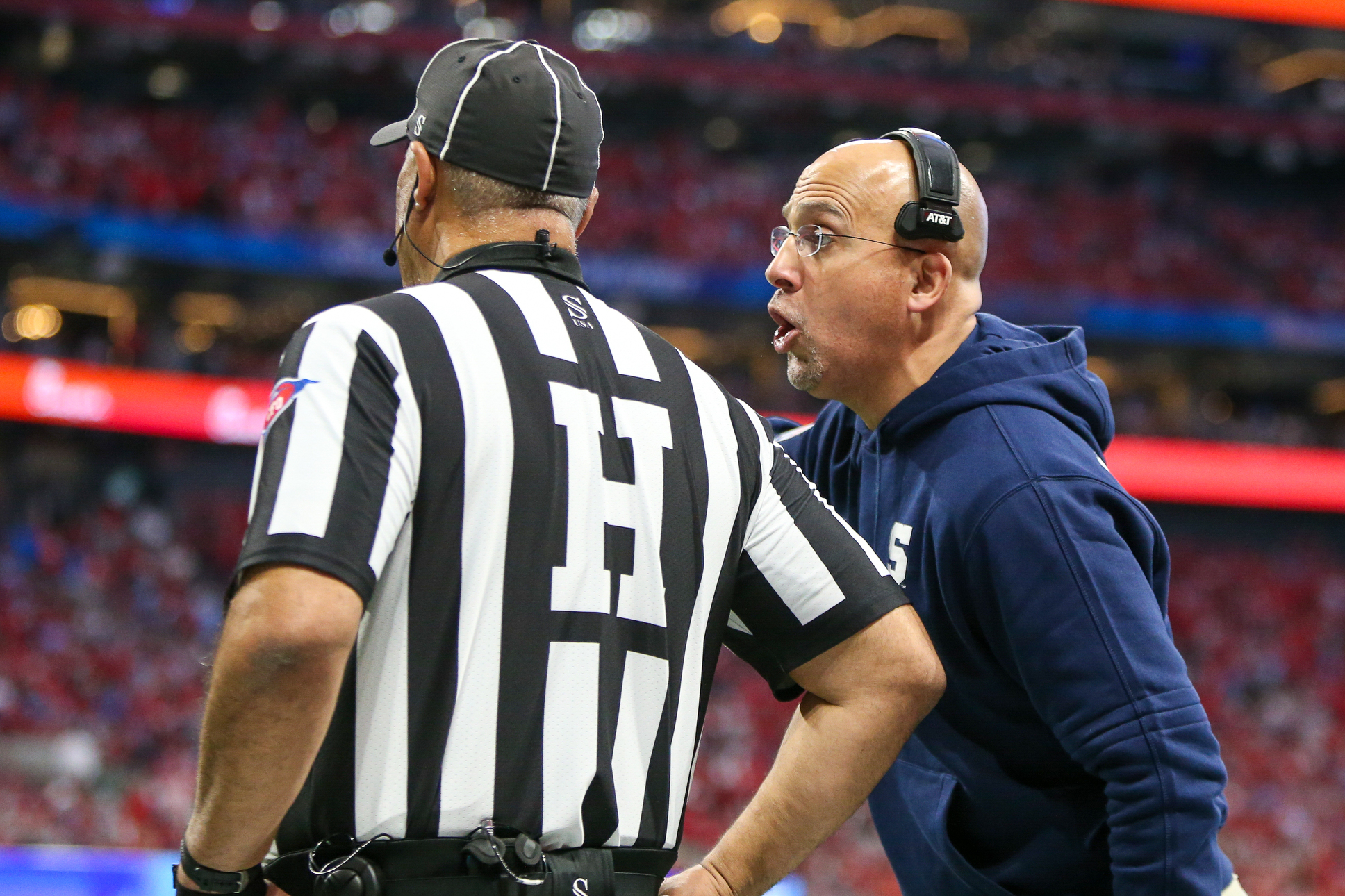 Dec 30, 2023; Atlanta, GA, USA; Penn State Nittany Lions head coach James Franklin talks to a referee against the Mississippi Rebels in the second half at Mercedes-Benz Stadium.