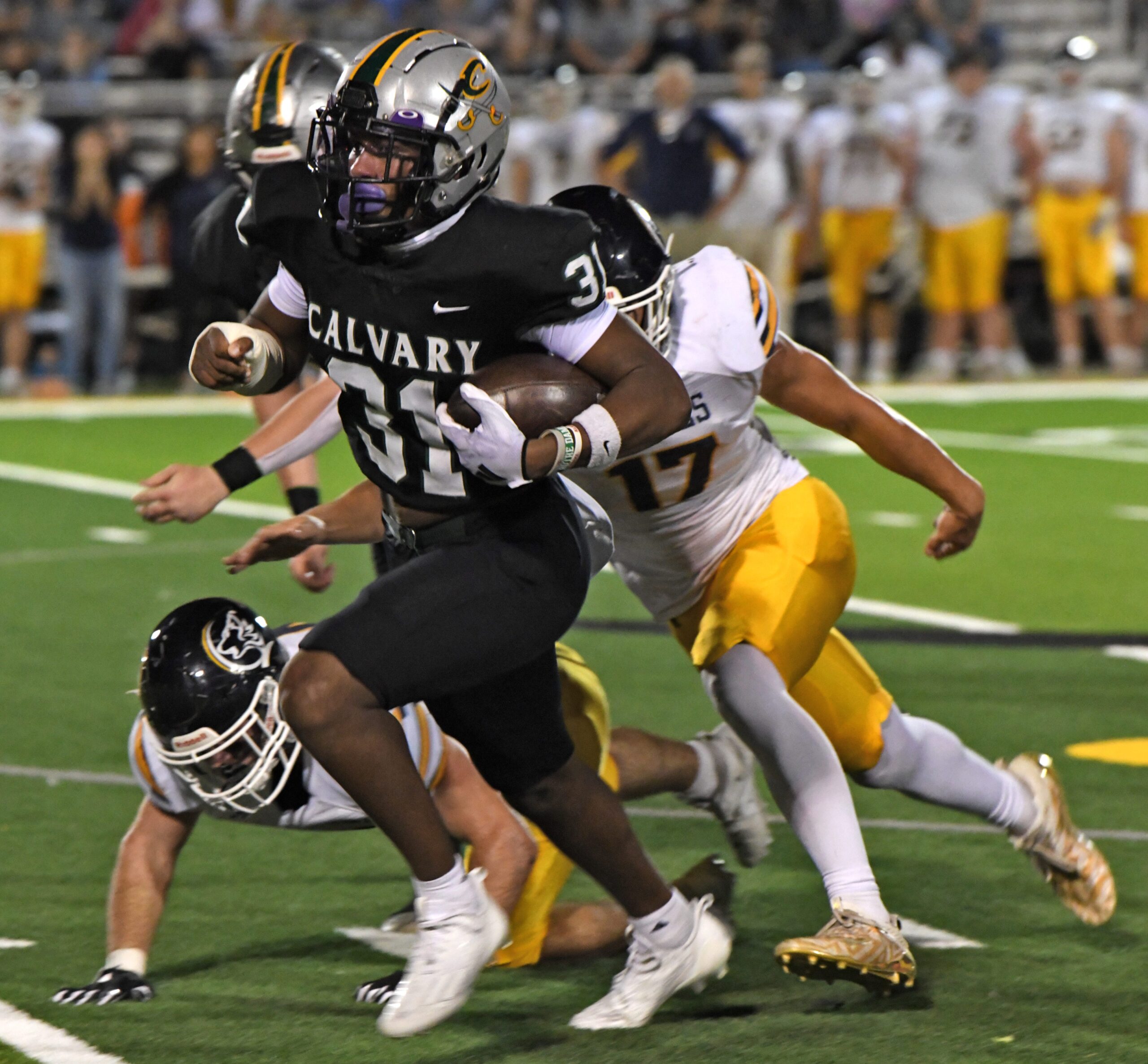 Calvary's James Simon moves the ball against D'Arbonne Woods Friday 10-20-23.