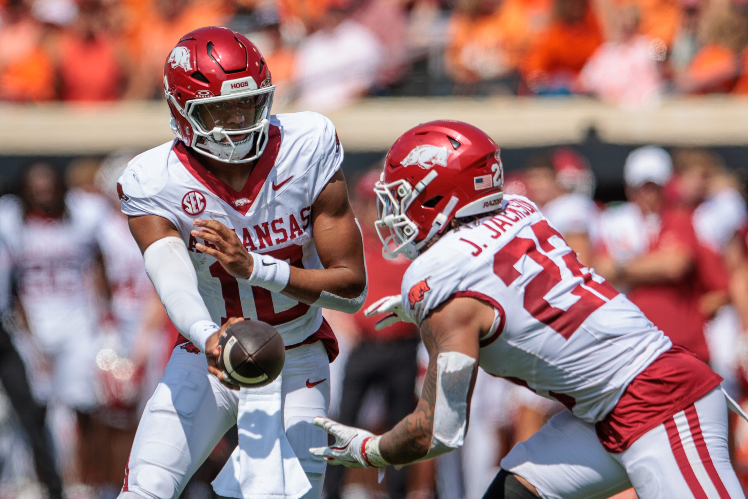 Sep 7, 2024; Stillwater, Oklahoma, USA; Arkansas Razorbacks quarterback Taylen Green (10) hands off to Arkansas Razorbacks running back Ja'Quinden Jackson (22) during the second quarter against the Oklahoma State Cowboys at Boone Pickens Stadium. 