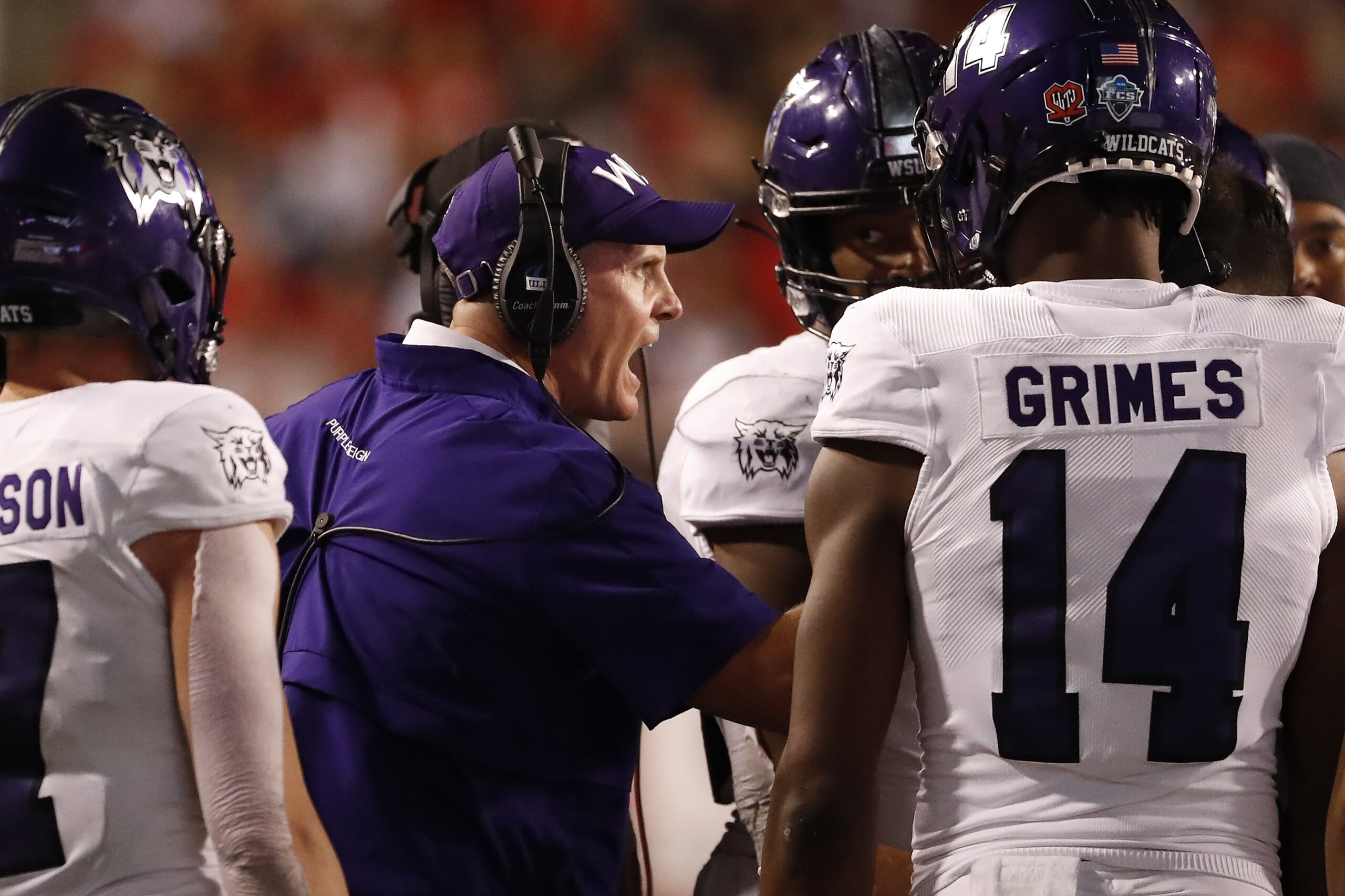 Sep 2, 2021; Salt Lake City, Utah, USA; Weber State Wildcats head coach Jay Hill reacts in the fourth quarter against the Utah Utes at Rice-Eccles Stadium.
