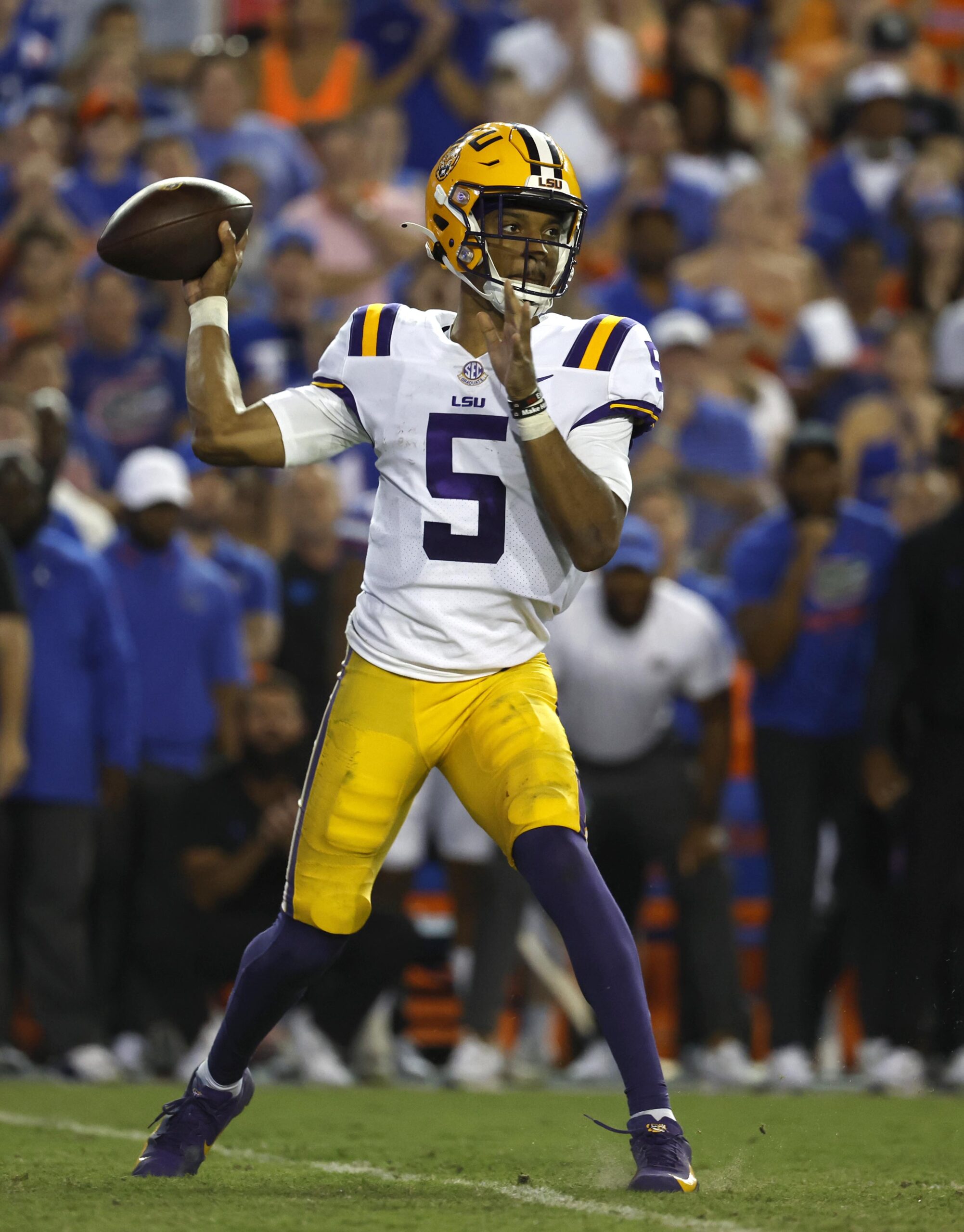 Oct 15, 2022; Gainesville, Florida, USA;LSU Tigers quarterback Jayden Daniels (5) throws the ball against the Florida Gators during the second half at Ben Hill Griffin Stadium.