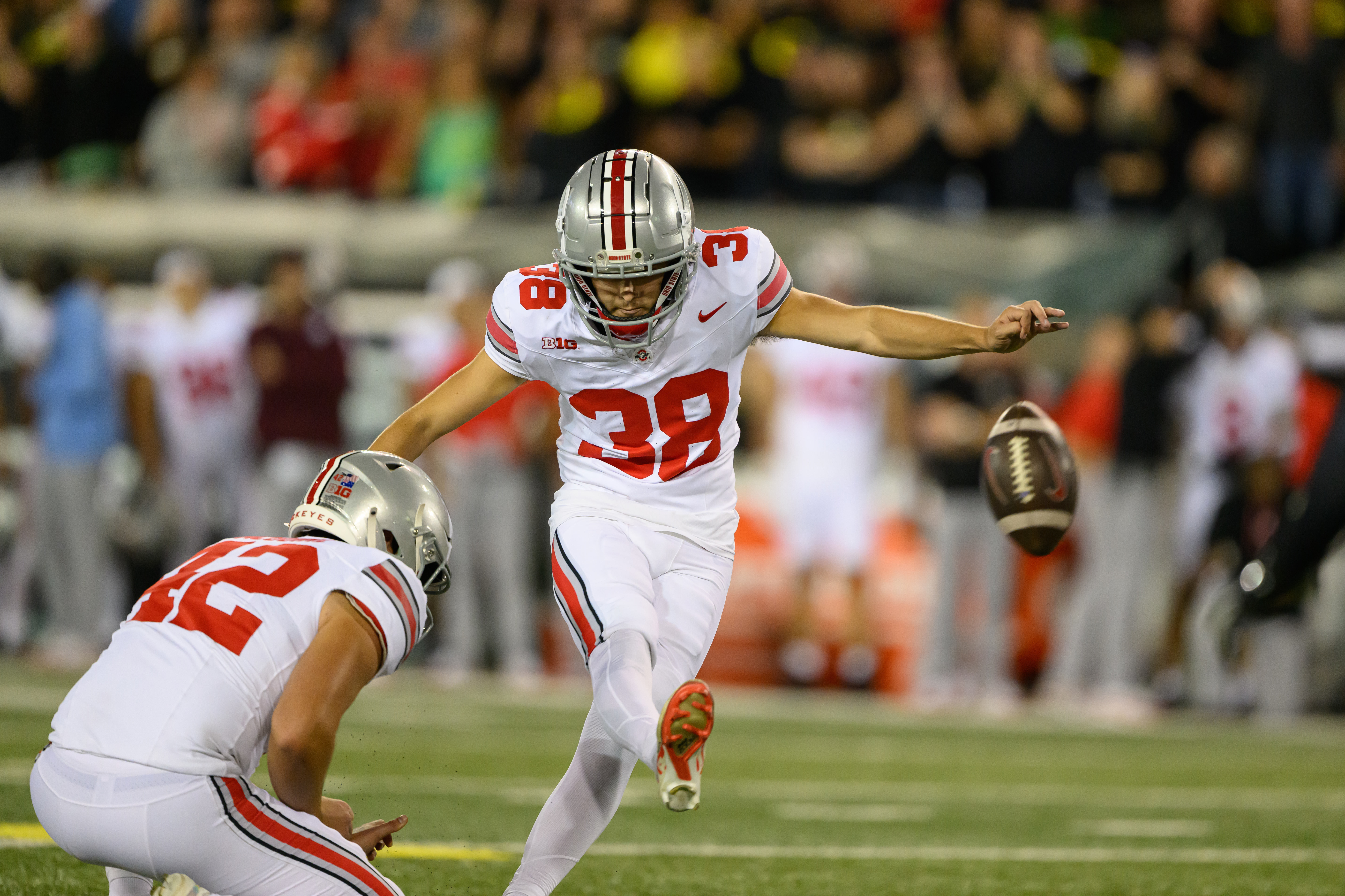 Oct 12, 2024; Eugene, Oregon, USA; Ohio State Buckeyes place kicker Jayden Fielding (38) kicks a field goal during the fourth quarter against the Oregon Ducks at Autzen Stadium.