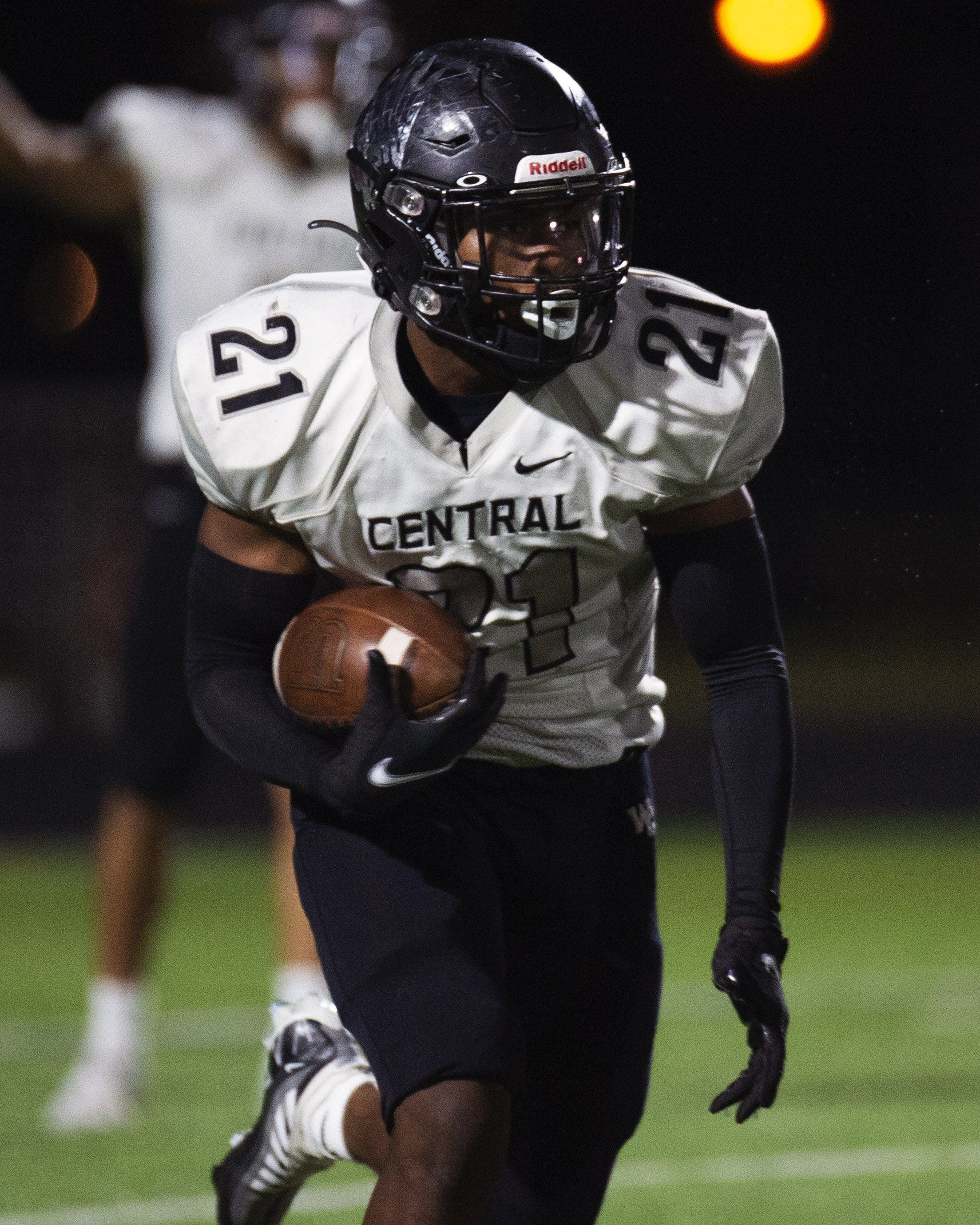 Westerville Central running back Jayden Gwinn (21) carries the ball against Upper Arlington in a Division I regional quarterfinal Nov. 4.