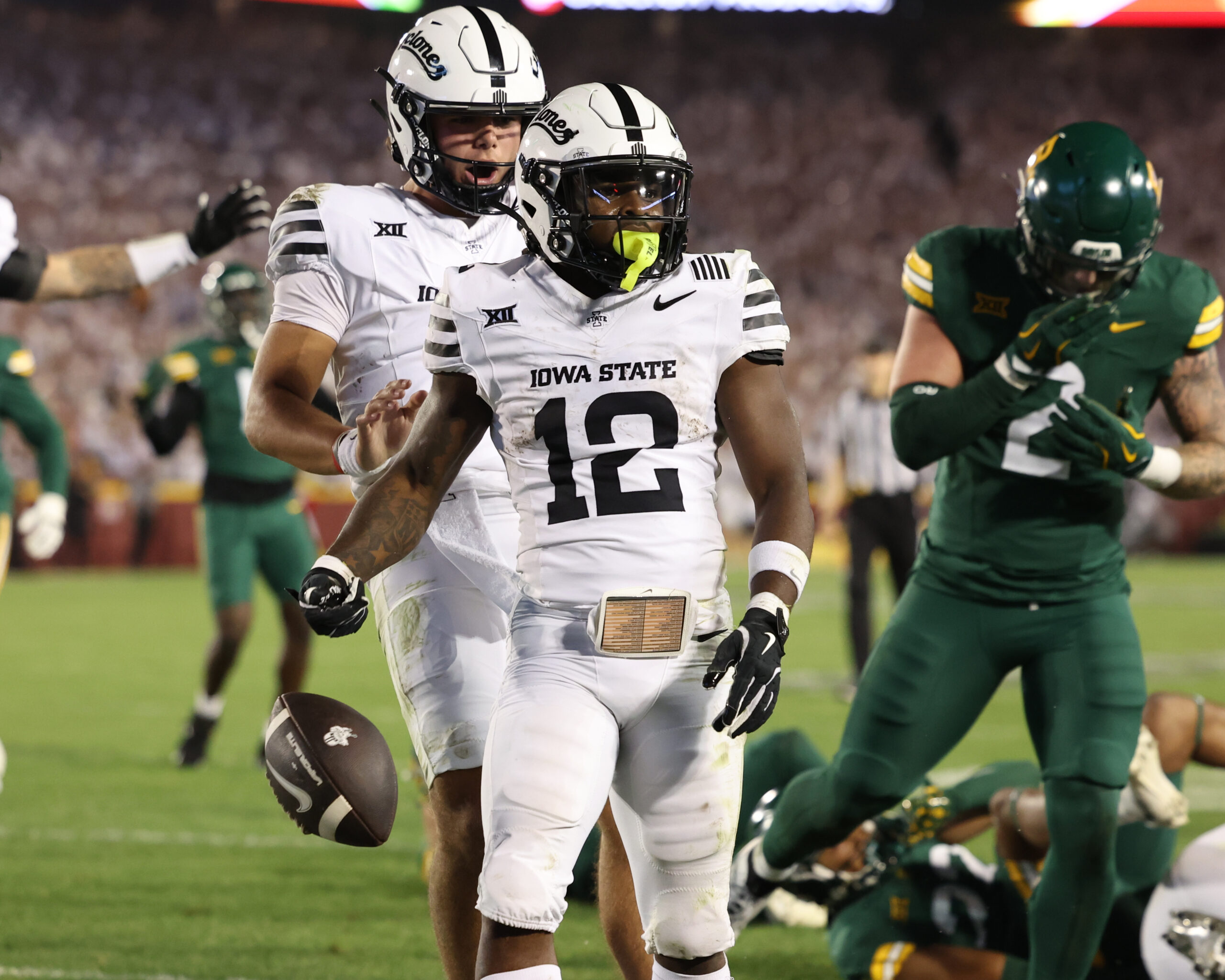 Oct 5, 2024; Ames, Iowa, USA; Iowa State Cyclones running back Jaylon Jackson (12) celebrates after scoring a touchdown against the Baylor Bears at Jack Trice Stadium.