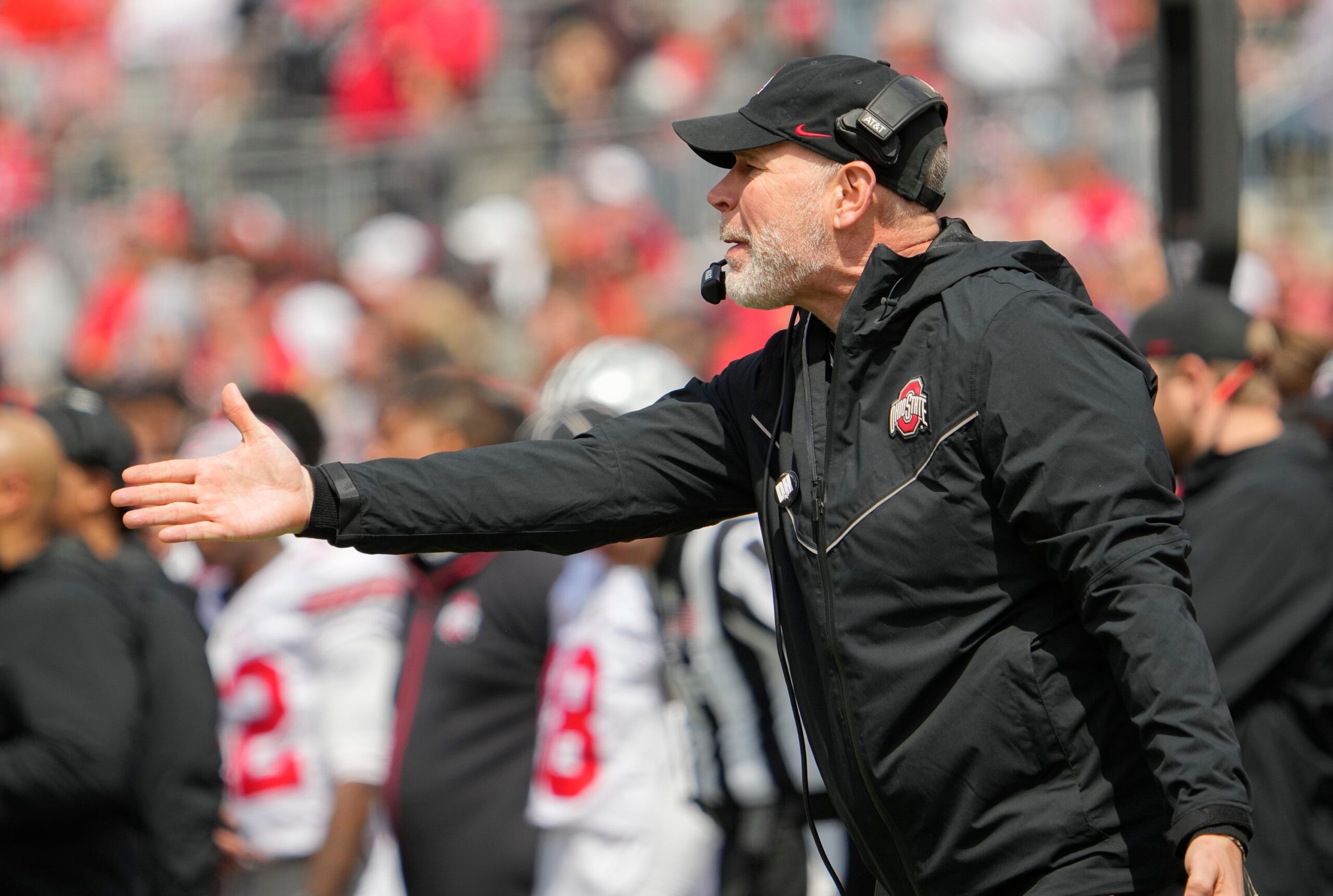 Ohio State Buckeyes defensive coordinator Jim Knowles motions to players during the spring football game at Ohio Stadium in Columbus on April 16, 2022.