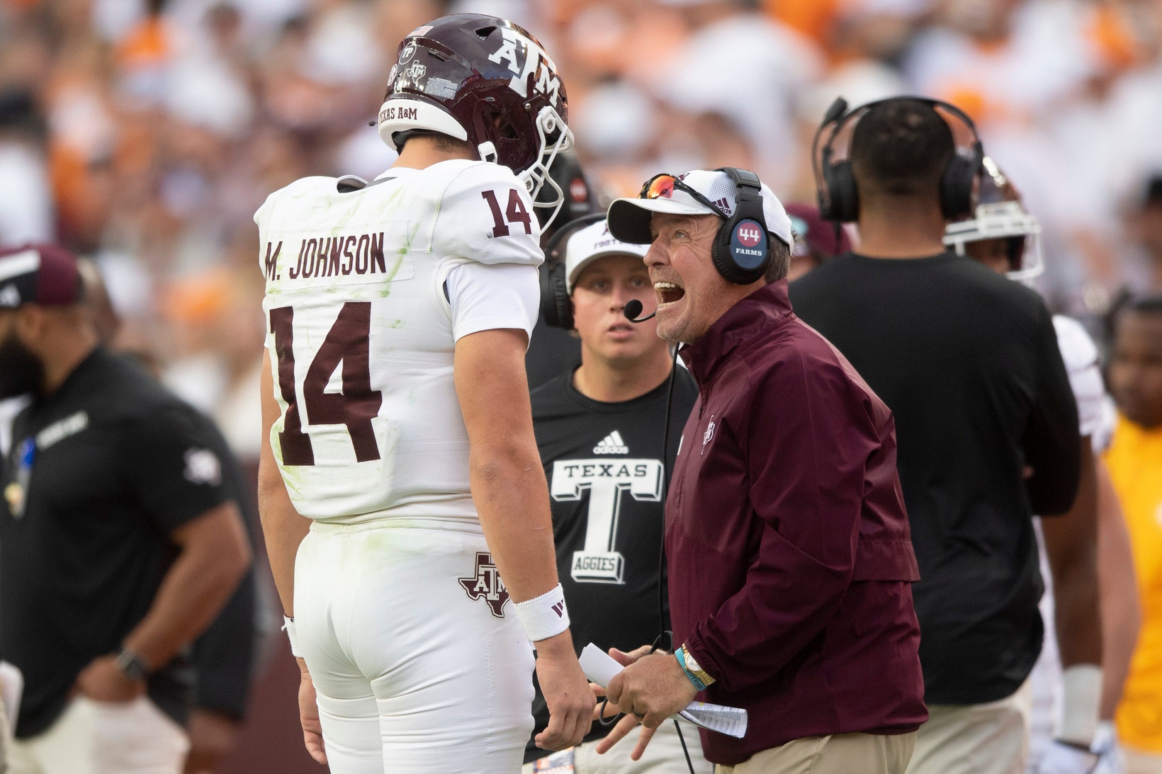 Texas A&M quarterback Max Johnson (14) is yelled to by Texas A&M head coach Jimbo Fisher during a football game between Tennessee and Texas A&M at Neyland Stadium in Knoxville, Tenn., on Saturday, Oct. 14, 2023.