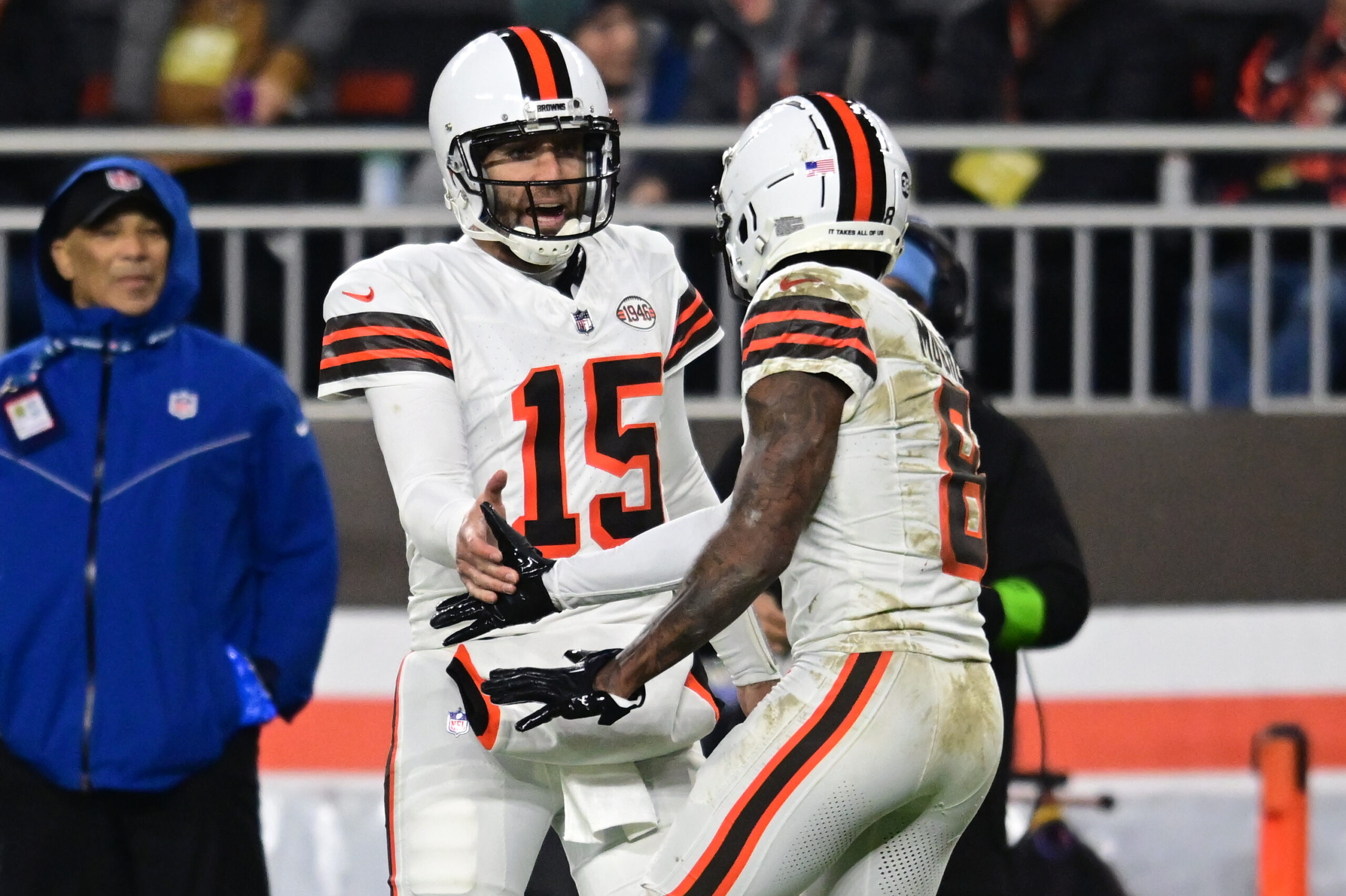 Dec 28, 2023; Cleveland, Ohio, USA; Cleveland Browns quarterback Joe Flacco (15) and wide receiver Elijah Moore (8) celebrate after a touchdown against the New York Jets during the first half at Cleveland Browns Stadium. 