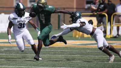 John Forster of St. Joseph's on his way to a 98 yard TD reception as DePaul lost to St. Joseph's 36-31 in Montvale