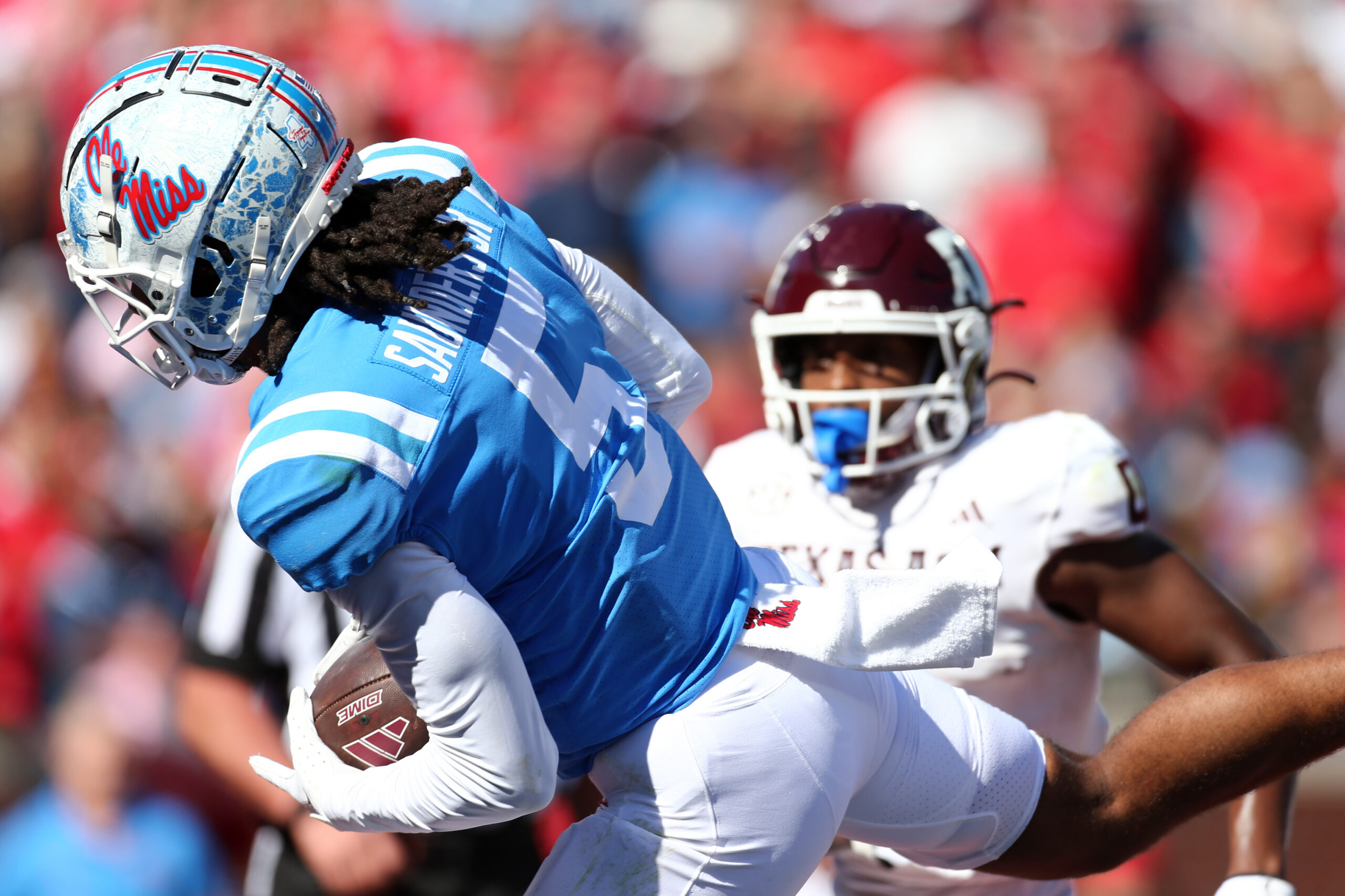 Nov 4, 2023; Oxford, Mississippi, USA; Mississippi Rebels defensive back John Saunders Jr. (5) intercepts the ball in the end zone during the second half against the Texas A&M Aggies at Vaught-Hemingway Stadium.