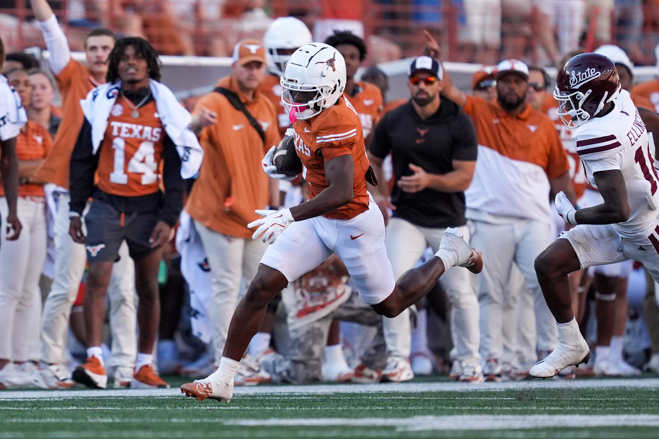 Sep 28, 2024; Austin, Texas, USA; Texas Longhorns wide receiver Johntay Cook II (1) runs the ball in the second half against the Mississippi State Bulldogs at Darrell K Royal-Texas Memorial Stadium.