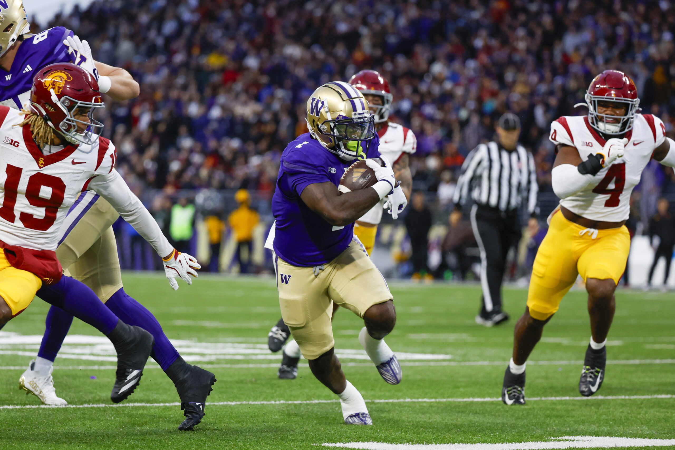Jul 25, 2024; Indianapolis, IN, USA; Washington Huskies running back Jonah Coleman speaks to the media during the Big 10 football media day at Lucas Oil Stadium