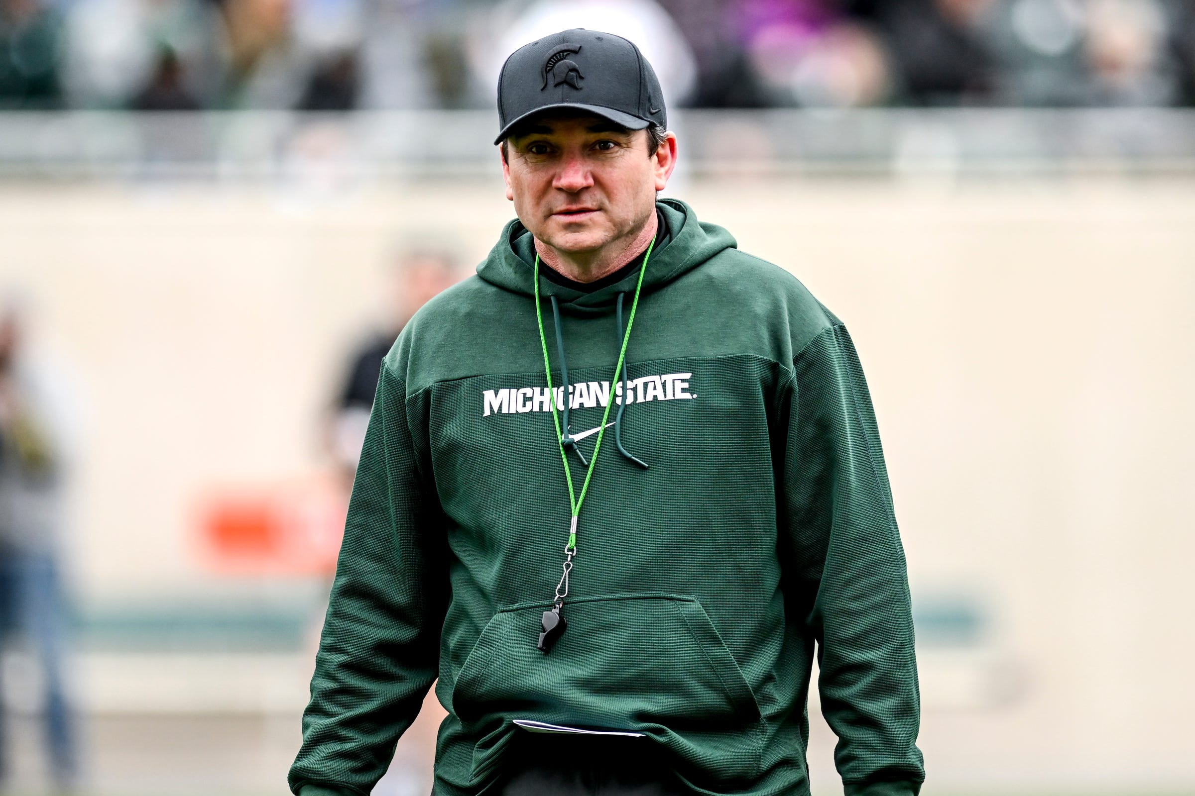 Michigan State's head coach Jonathan Smith walks to the sideline during the Spring Showcase on Saturday, April 20, 2024, at Spartan Stadium in East Lansing.