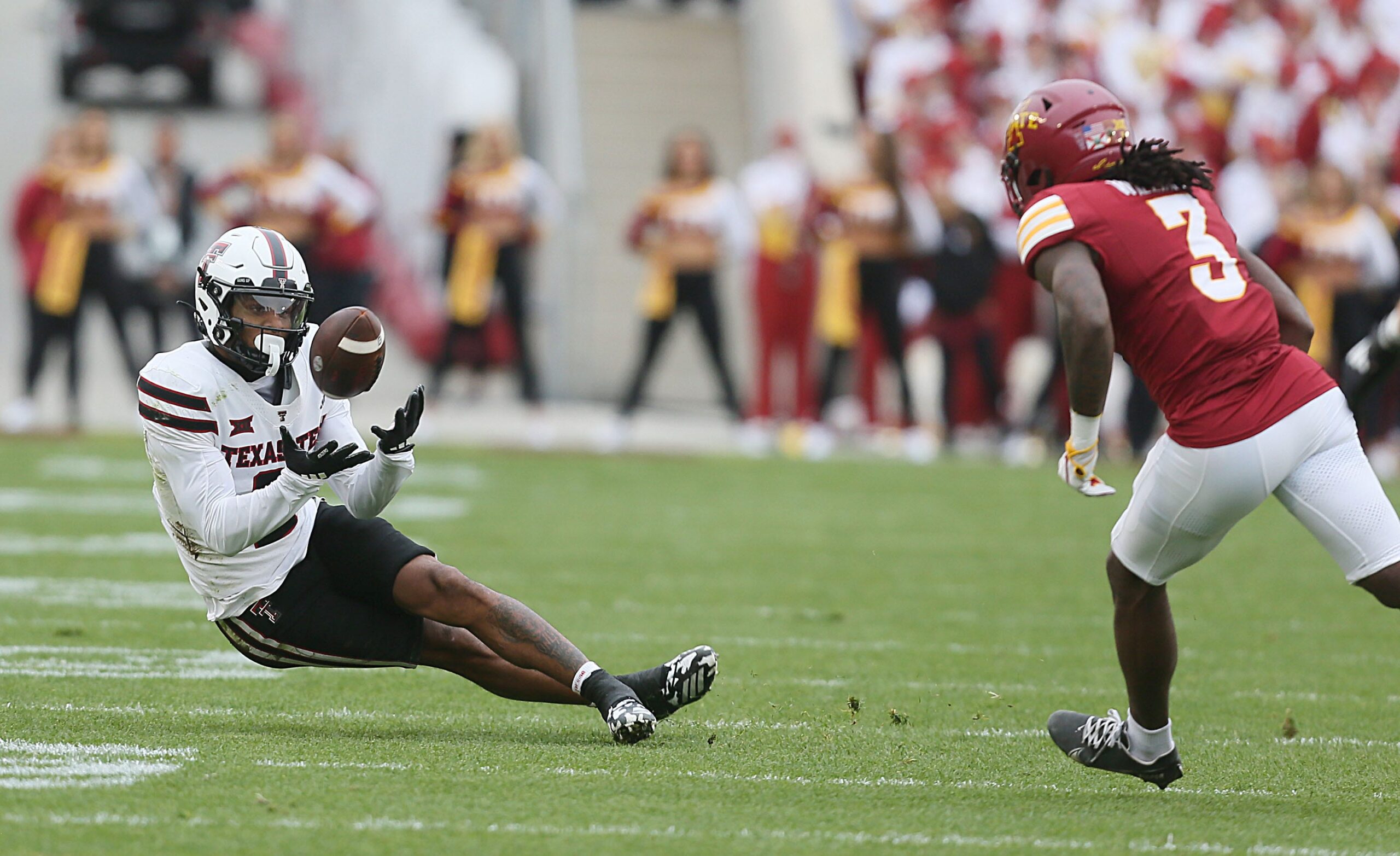 Nov 11, 2023; Berkeley, California, USA; Washington State Cougars wide receiver Josh Kelly (3) catches a touchdown pass against California Golden Bears defensive back Kaylin Moore (4) during the fourth quarter at California Memorial Stadium.