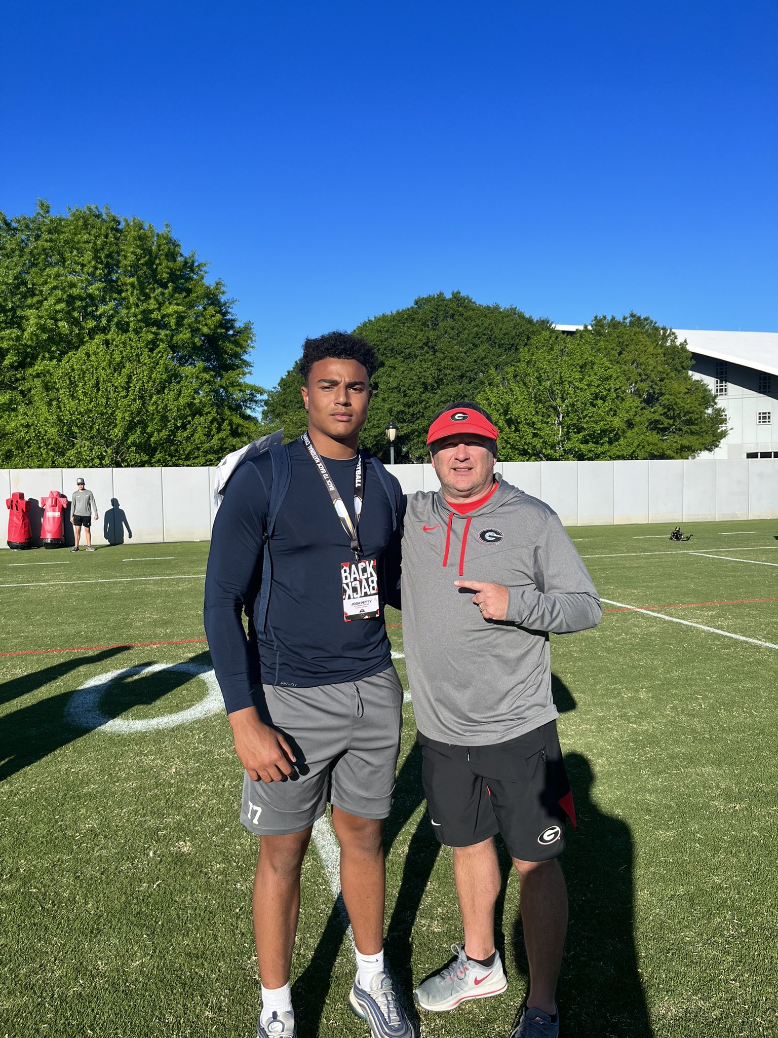 Four-star 2025 Offensive Tackle Josh Petty from Roswell, GA (Fellowship Christian School) takes a picture with Kirby Smart