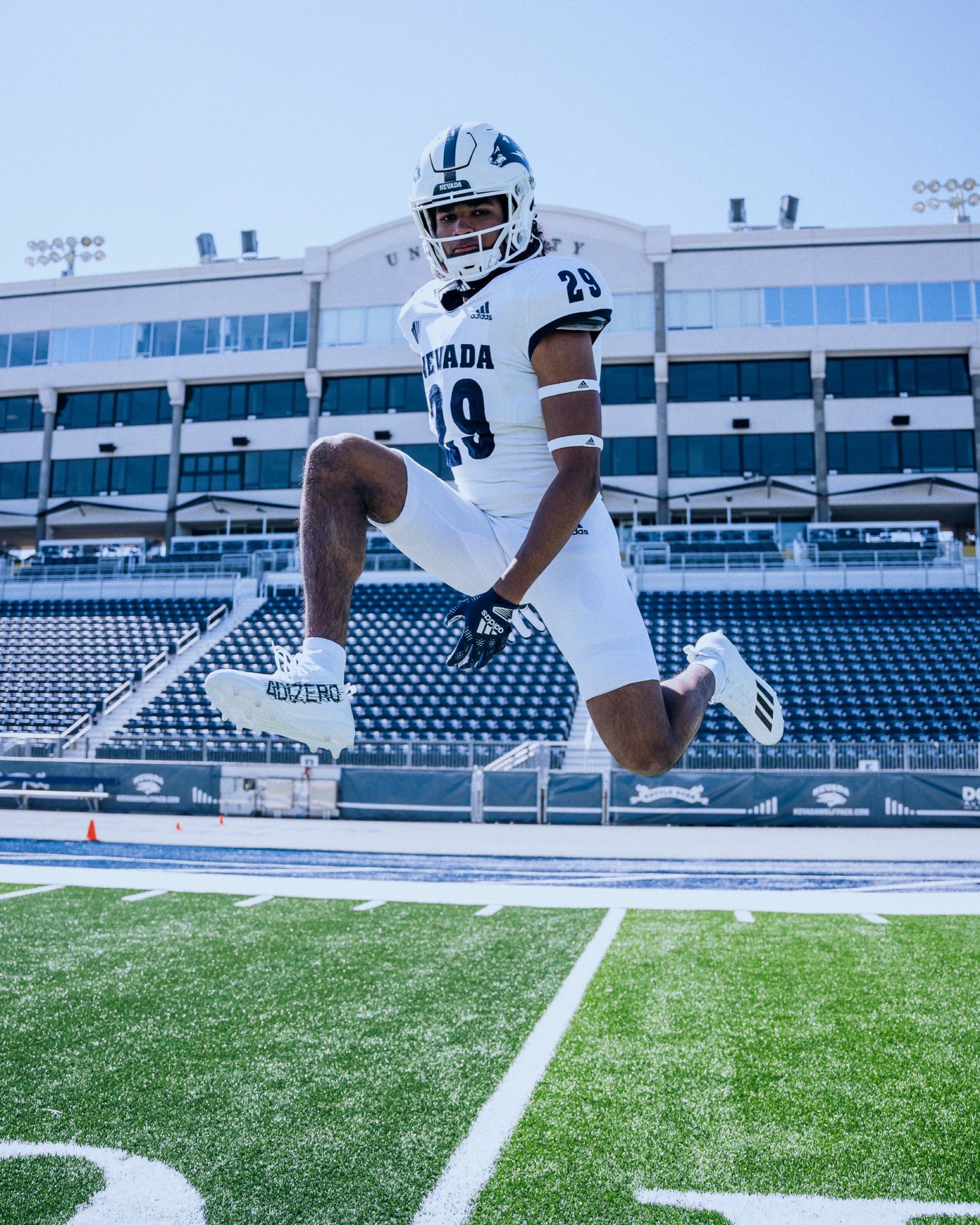 2025 3-star RB Julian McMahan from Danville, California (Monte Vista) takes a picture inside Mackay Stadium during a visit to Nevada