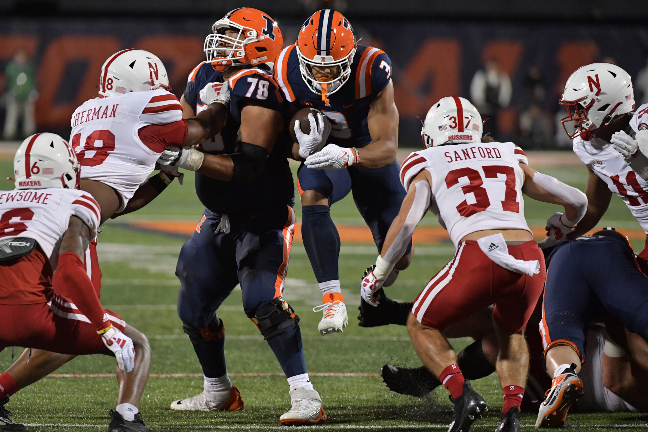 Oct 6, 2023; Champaign, Illinois, USA; Illinois Fighting Illini running back Kaden Feagin (3) runs through an opening in the Nebraska Cornhuskers defense during the first half at Memorial Stadium.