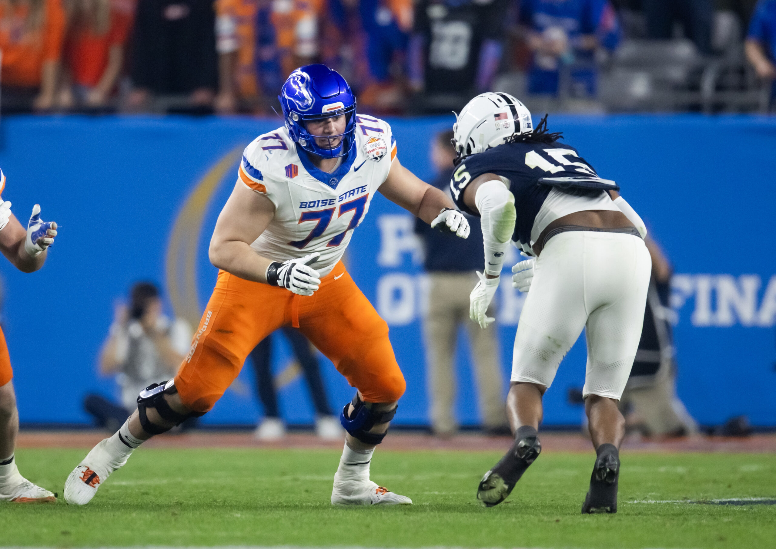 Dec 31, 2024; Glendale, AZ, USA; Boise State Broncos offensive tackle Kage Casey (77) against the Penn State Nittany Lions during the Fiesta Bowl at State Farm Stadium.