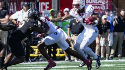 Florida State Seminoles wide receiver Keon Coleman (4) runs with the ball against LSU in the Camping World Kickoff on Sunday