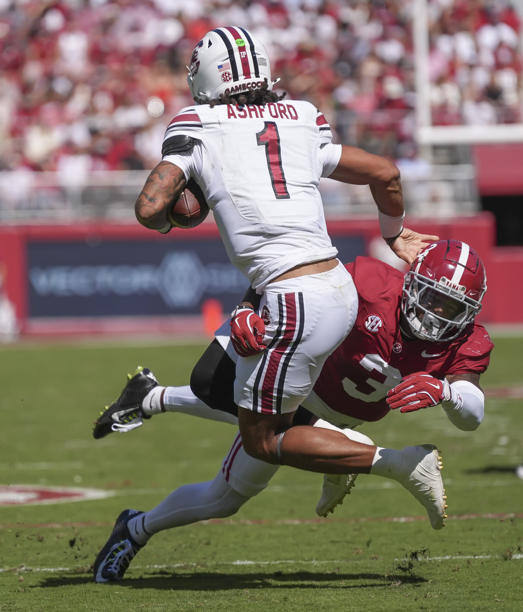 Jan 8, 2024; Houston, TX, USA; Washington Huskies wide receiver Ja'Lynn Polk (2) is unable to make a catch while defended by Michigan Wolverines defensive back Keon Sabb (3) during the fourth quarter in the 2024 College Football Playoff national championship game at NRG Stadium.