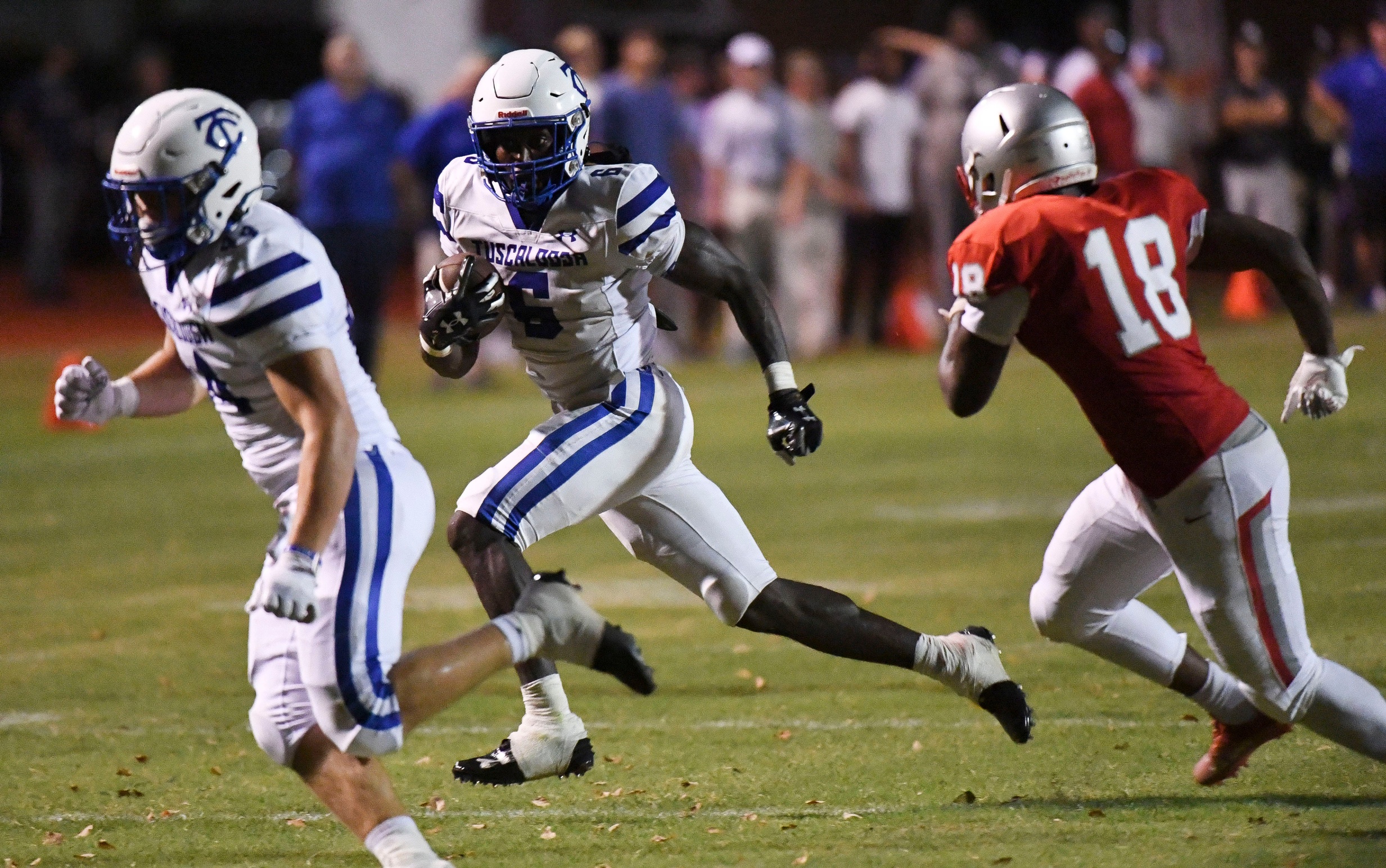 Tuscaloosa County running back Kevin Riley (6) follows blocker Tuscaloosa County running back Joe Saliba (44) as ce18 closes to make the tackle at Central High Friday, Aug. 25, 2023.