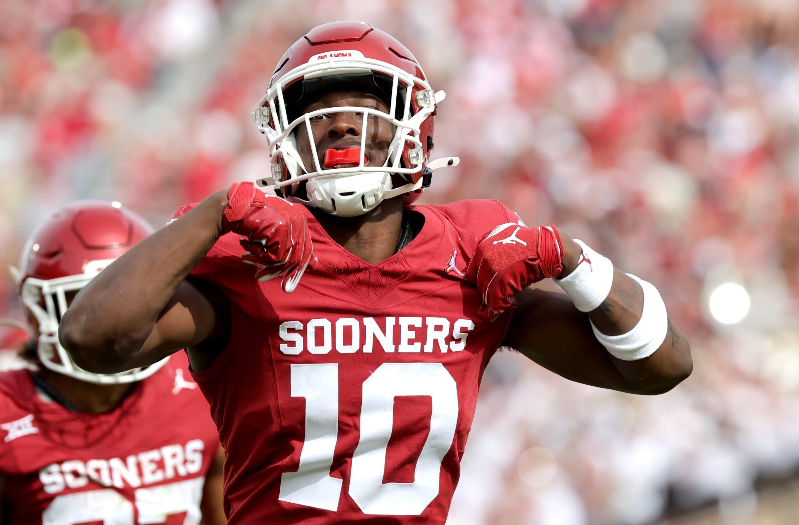 Oklahoma's Kip Lewis (10) celebrates a play in the first half of the college football game between the University of Oklahoma Sooners and the University of Central Florida Knights at Gaylord Family Oklahoma-Memorial Stadium in Norman, Okla., Saturday, Oct., 21, 2023.
