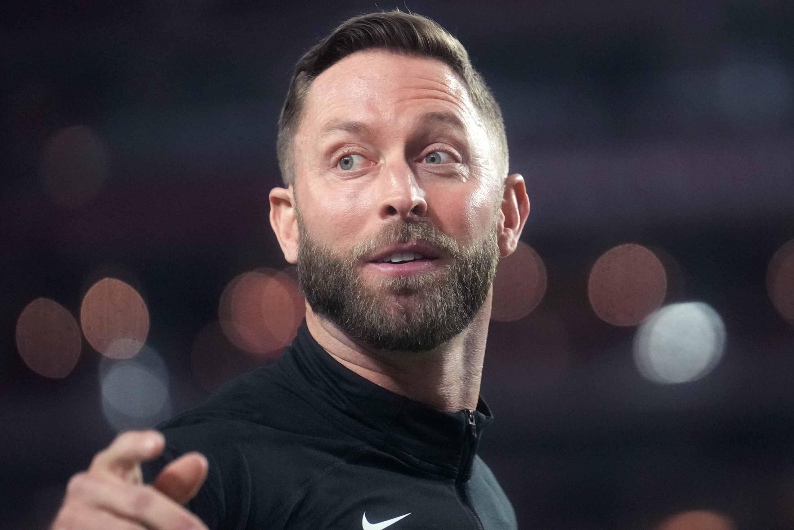 Dec 25, 2022; Glendale, Arizona, USA; Arizona Cardinals head coach Kliff Kingsbury takes the field before their game against the Tampa Bay Buccaneers at State Farm Stadium.