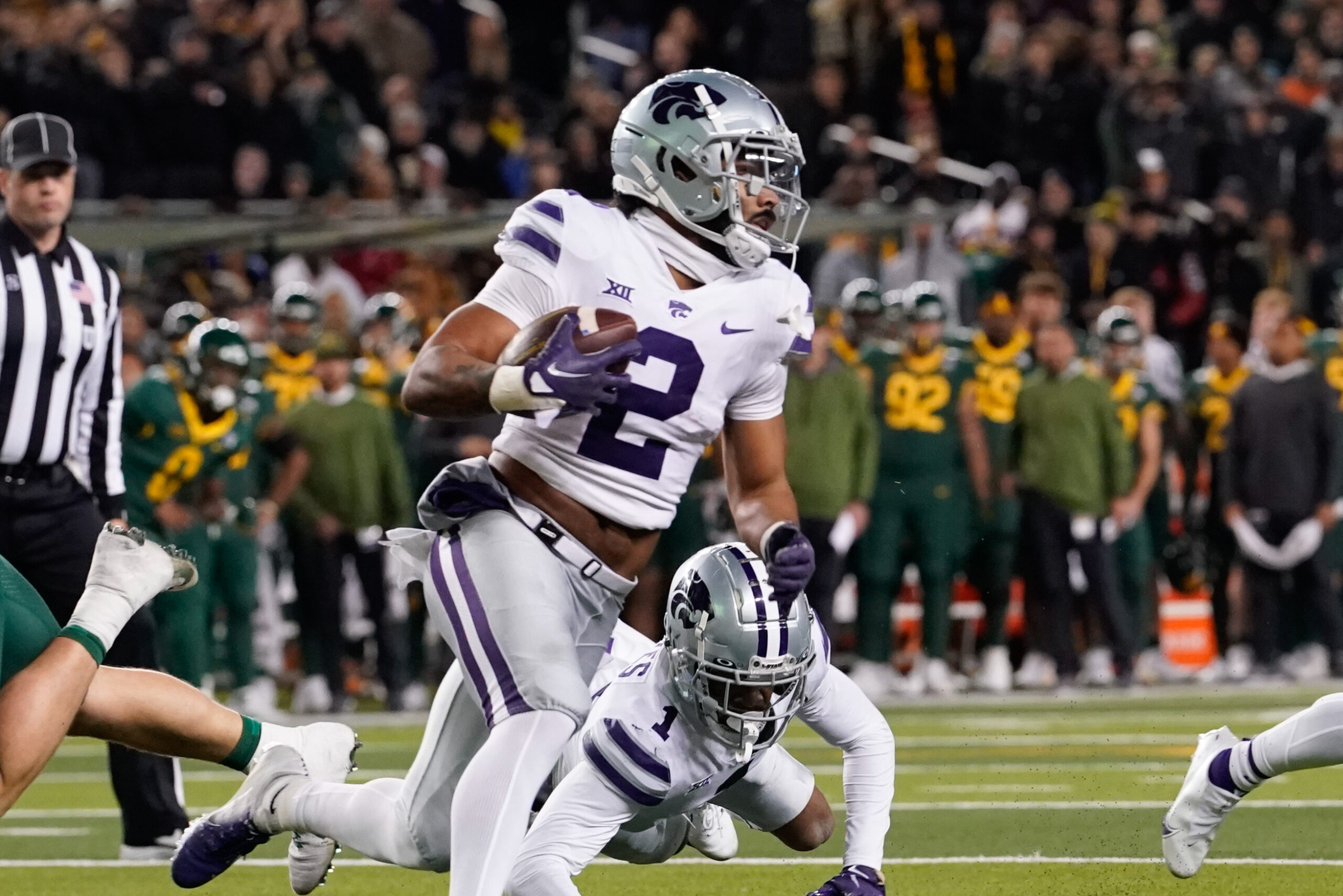 Nov 12, 2022; Waco, Texas, USA; Kansas State Wildcats safety Kobe Savage (2) makes an interception against the Baylor Bears during the first half at McLane Stadium.