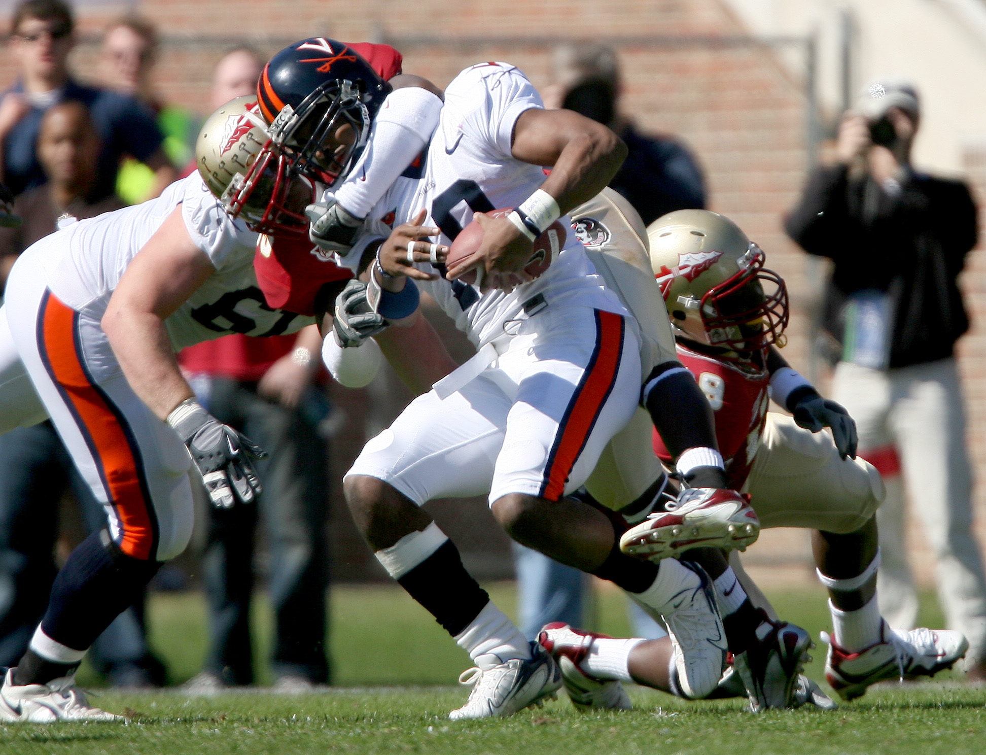 Nov 4, 2006; Tallahassee, FL, USA: Florida State Seminoles linebacker (83) Lawrence Timmons sacks Virginia Cavaliers quarterback (10) Jameel Sewell during the 1st quarter at Doak Campbell Stadium in Tallahassee, FL. 
