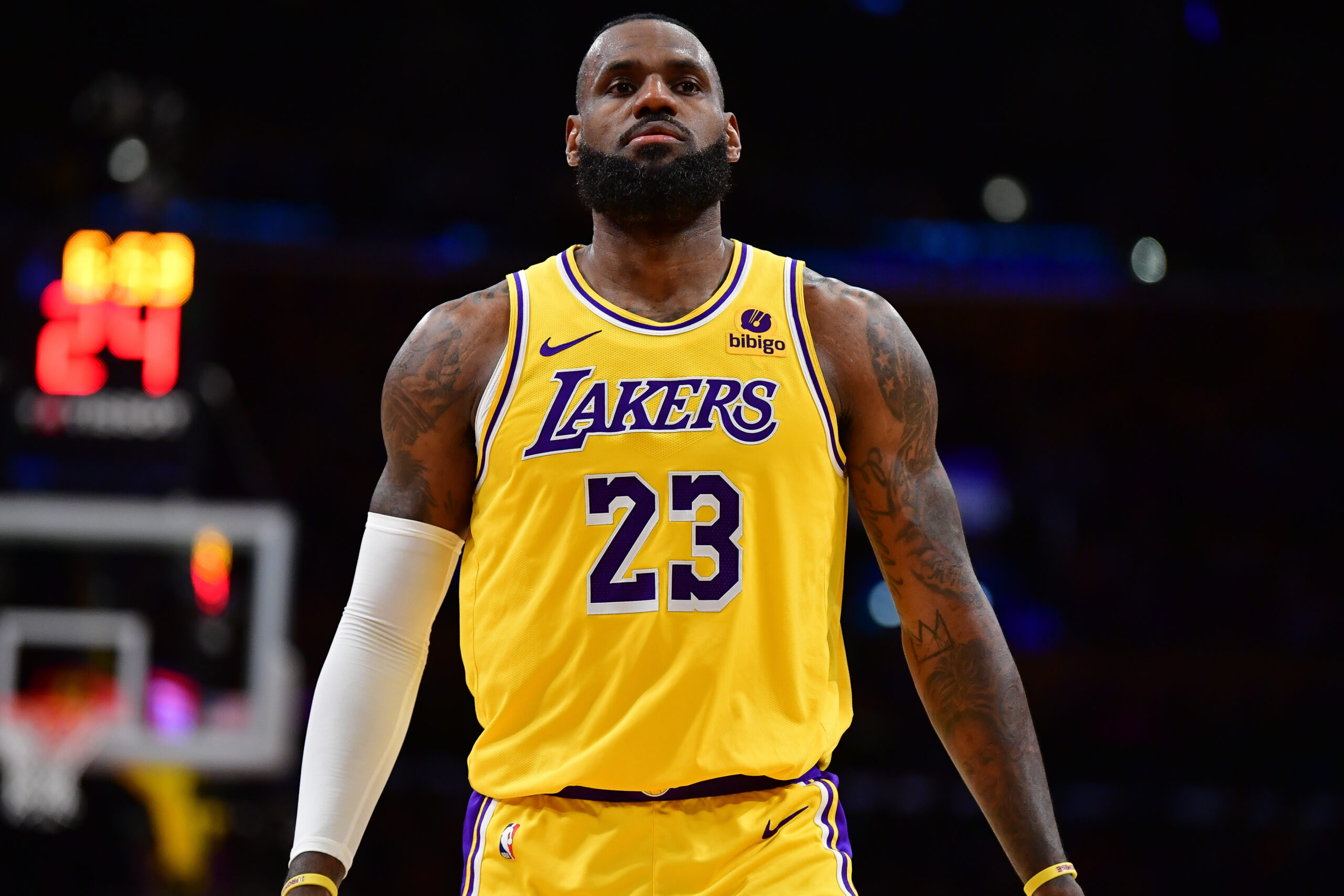 May 15, 2024; Chicago, IL, USA; LeBron James and his wife Savannah Brinson watch Bronny James participate in the 2024 NBA Draft Combine at Wintrust Arena.