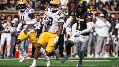 LSU runningback Logan Diggs 3 runs the ball as the LSU Tigers take on the Auburn Tigers at Tiger Stadium in Baton Rouge