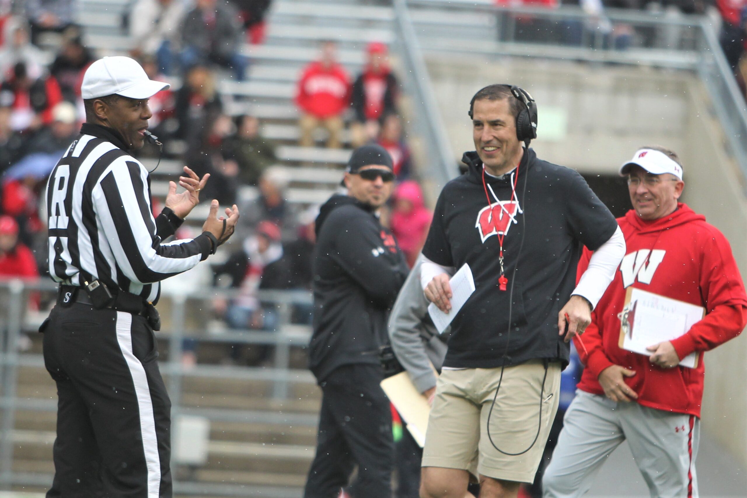 Wisconsin head coach Luke Fickell chats with an official during The Launch, the Badger football team's intrasquad scrimmage at Camp Randall Stadium in Madison, Wis. on Saturday April 22, 2023.