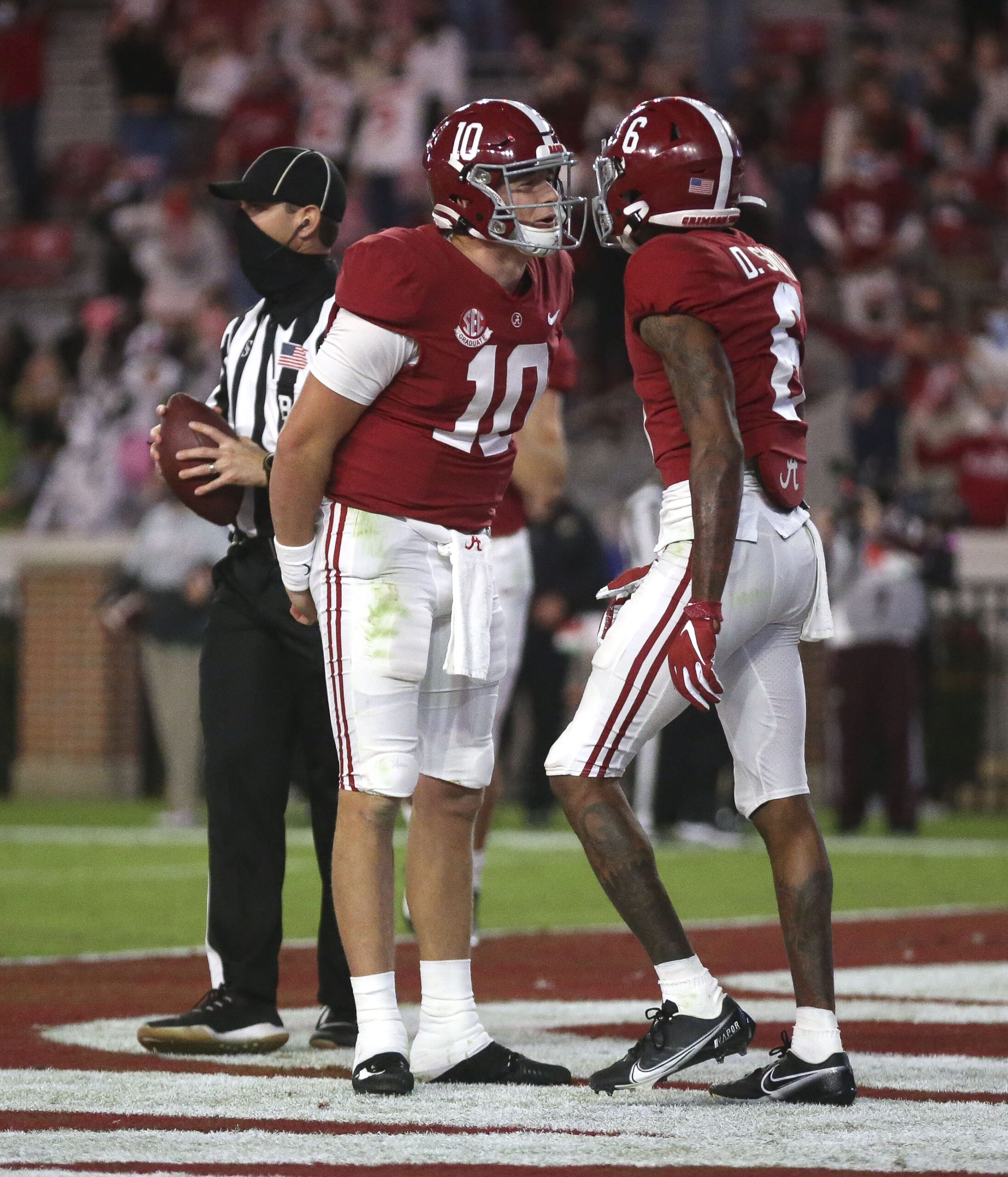 Oct 31, 2020; Tuscaloosa, Alabama, USA; Alabama quarterback Mac Jones (10) celebrates a touchdown pass with Alabama wide receiver DeVonta Smith (6) in the game with Mississippi State at Bryant-Denny Stadium.